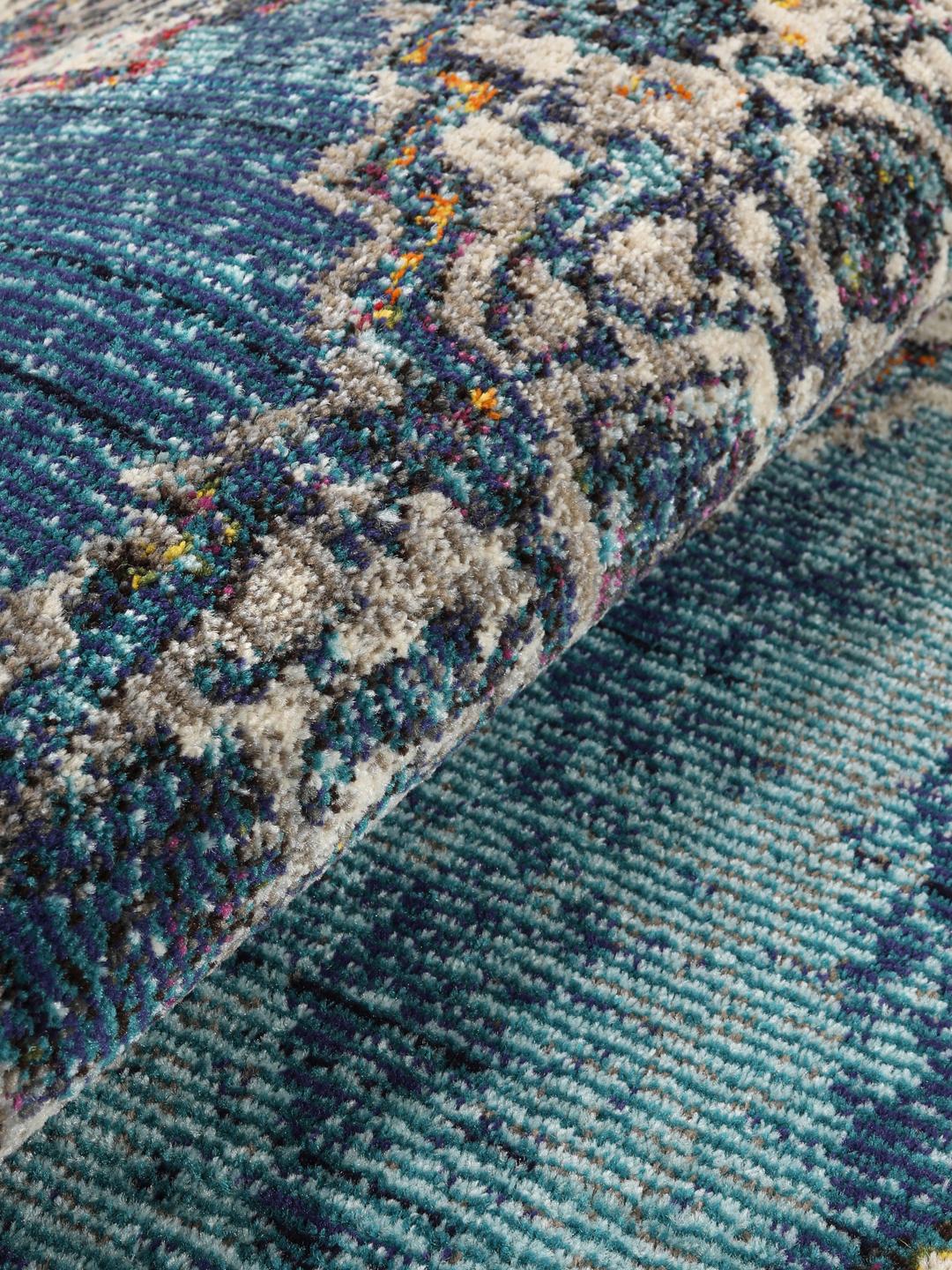 Tapis rond bleu canard foncé avec un motif médaillon complexe