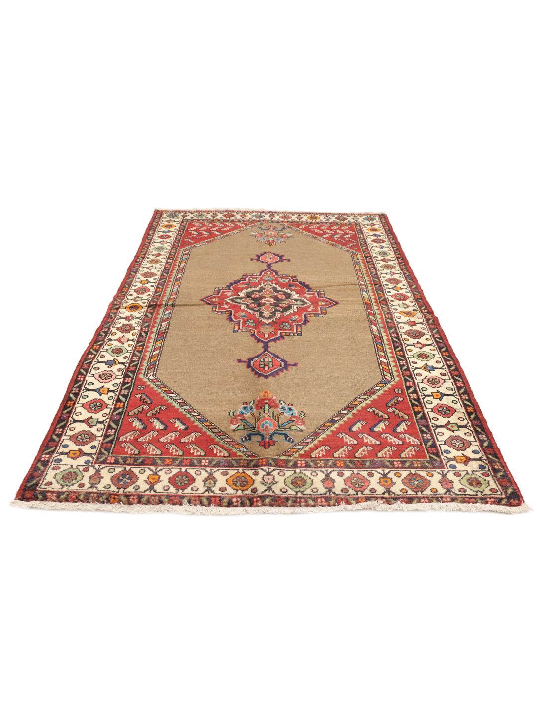 Hand-knotted wool rug from the Middle East in warm brown and red tones