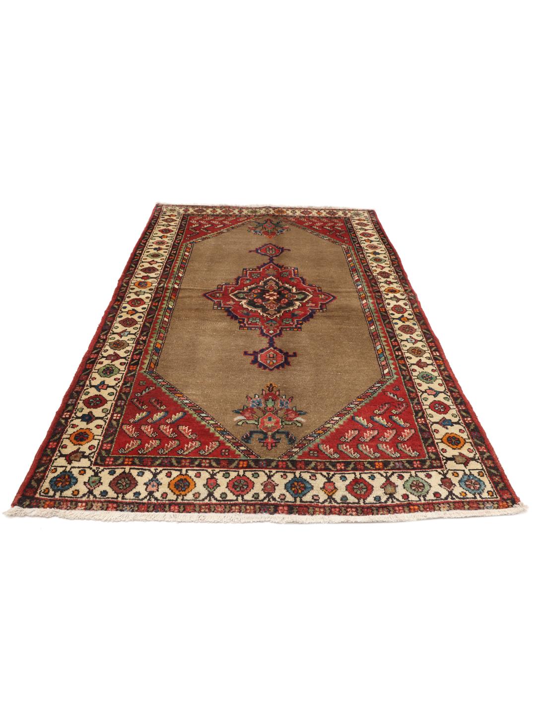 Hand-knotted wool rug from the Middle East in warm brown and red tones