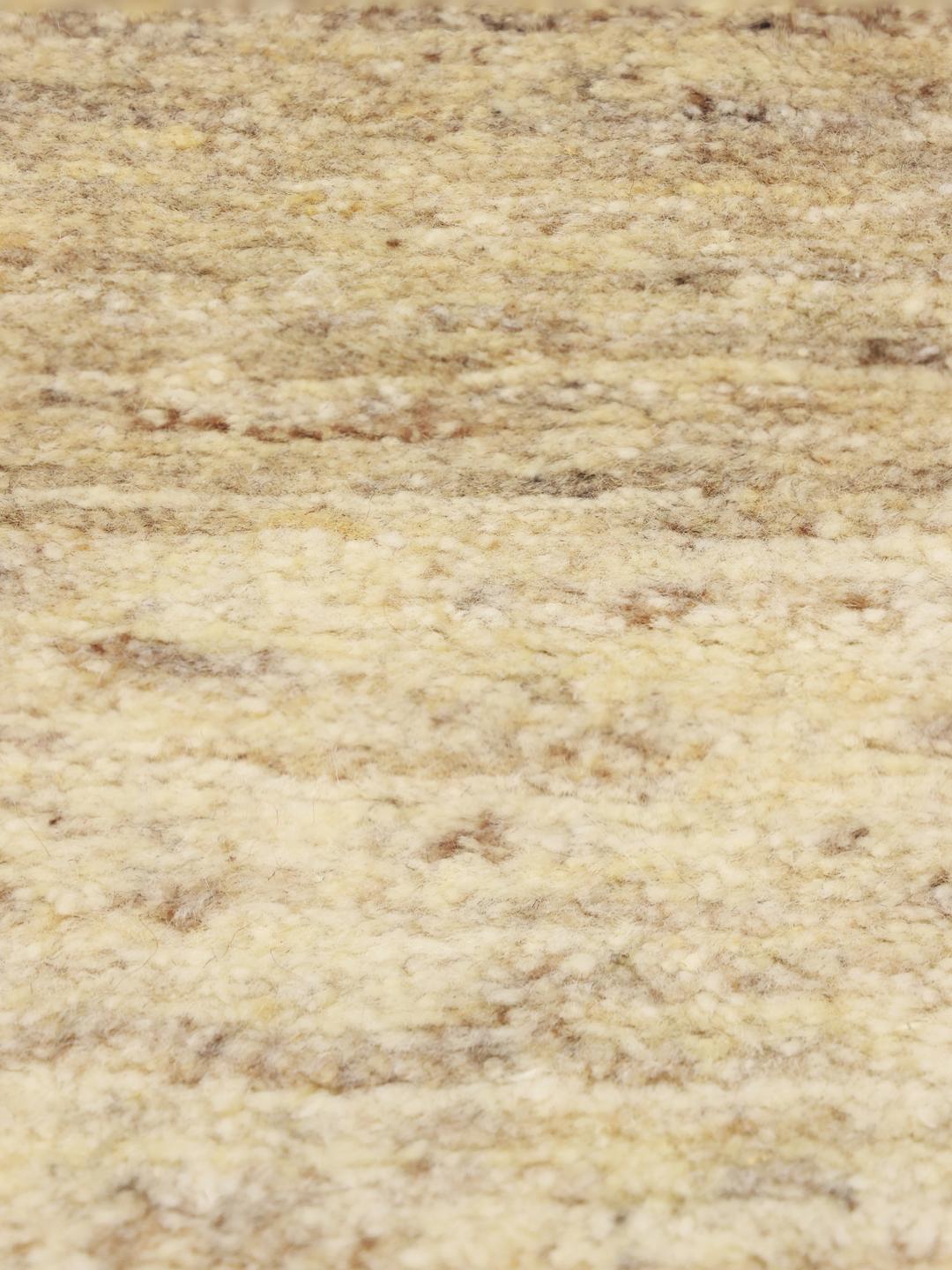 Håndknyttet Gabbeh-tæppe fra Mellemøsten i en blød beige tone