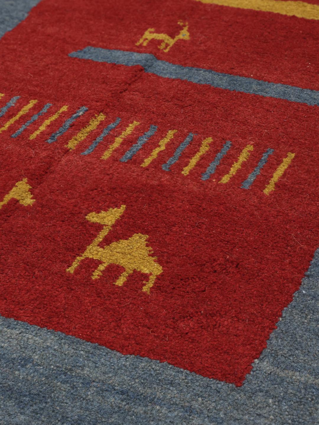 Handgeknoopt Gabbeh-tapijt met diermotieven in rood en blauw uit het Midden-Oosten