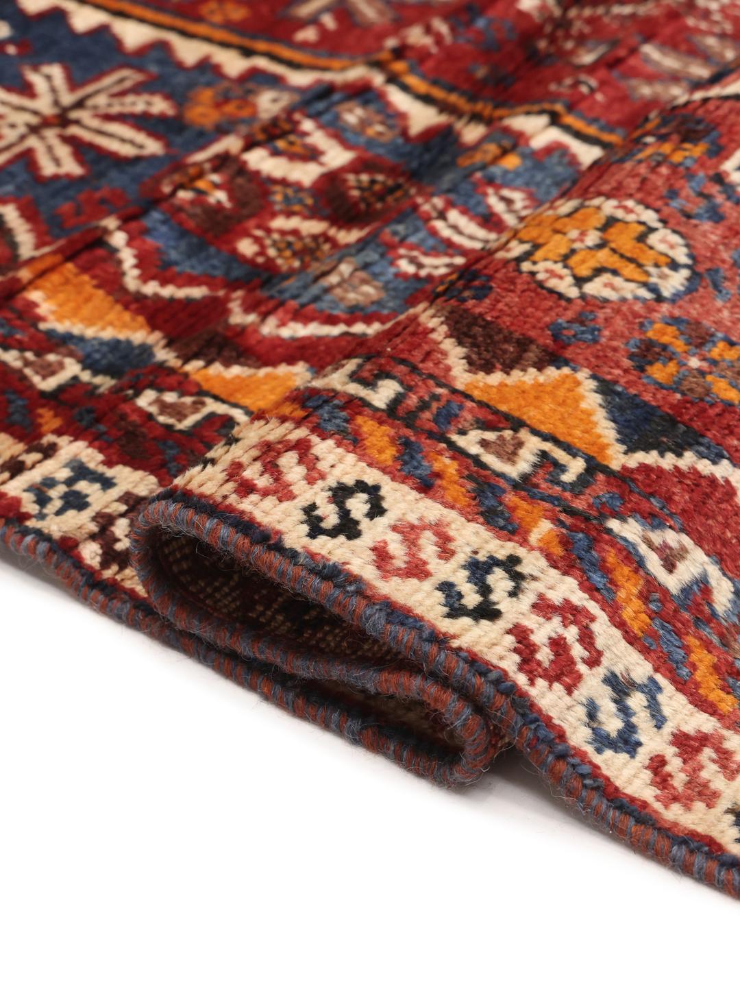 Hand-knotted Shiraz rug from the Middle East in red and blue tones