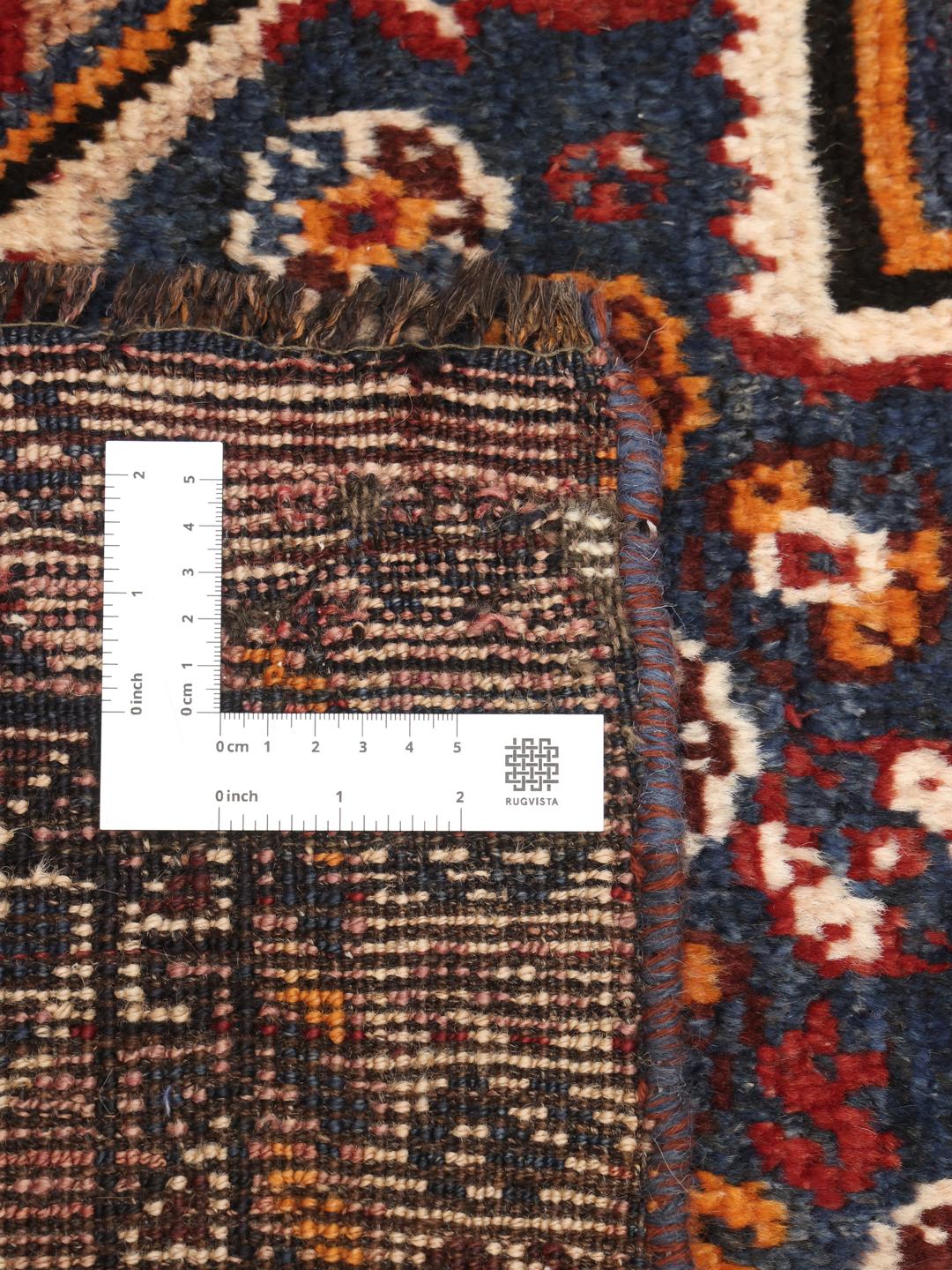 Hand-knotted Shiraz rug from the Middle East in red and blue tones