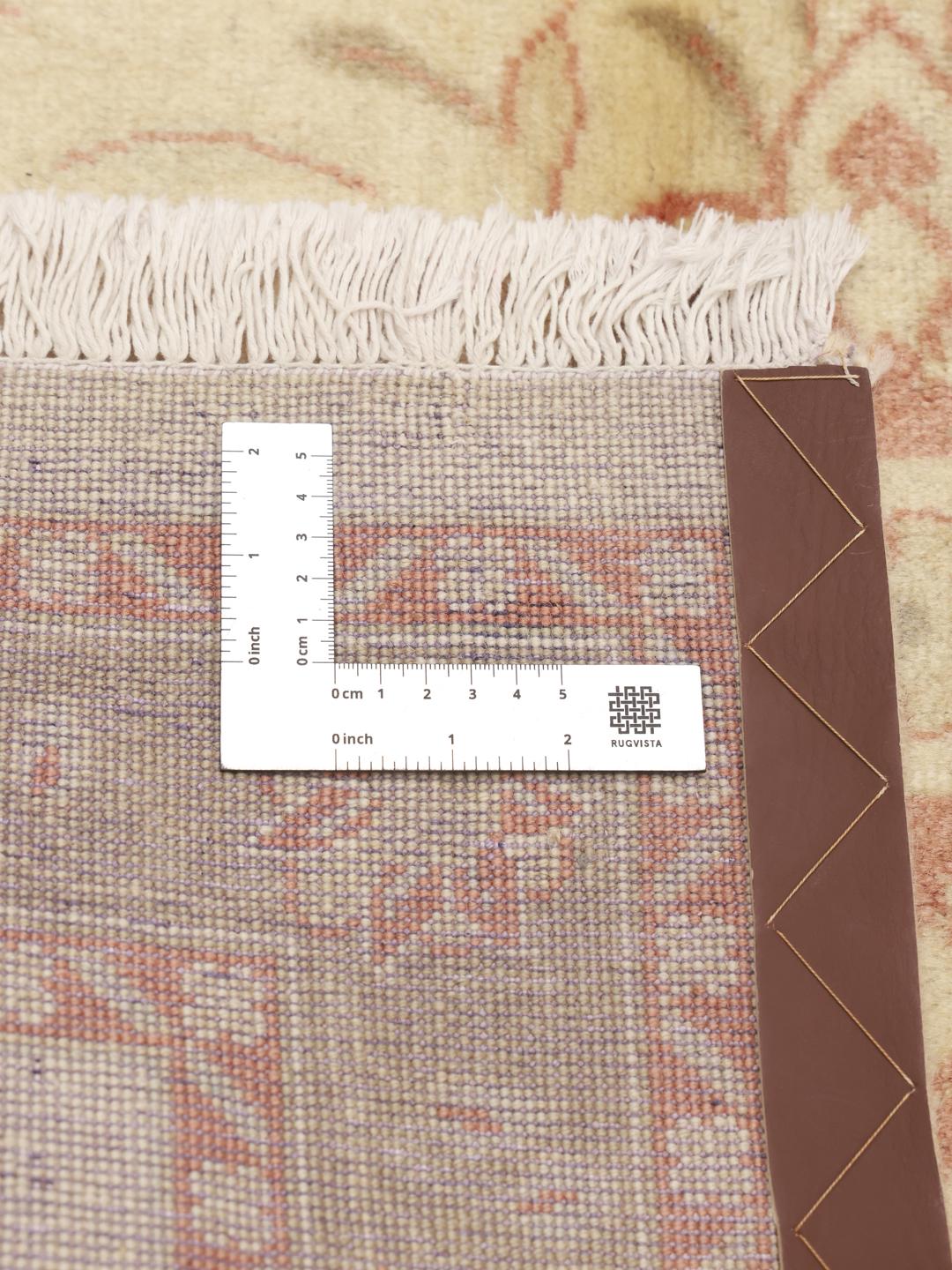 Handgeknoopt Tabriz wollen tapijt in beige en lichtgroen