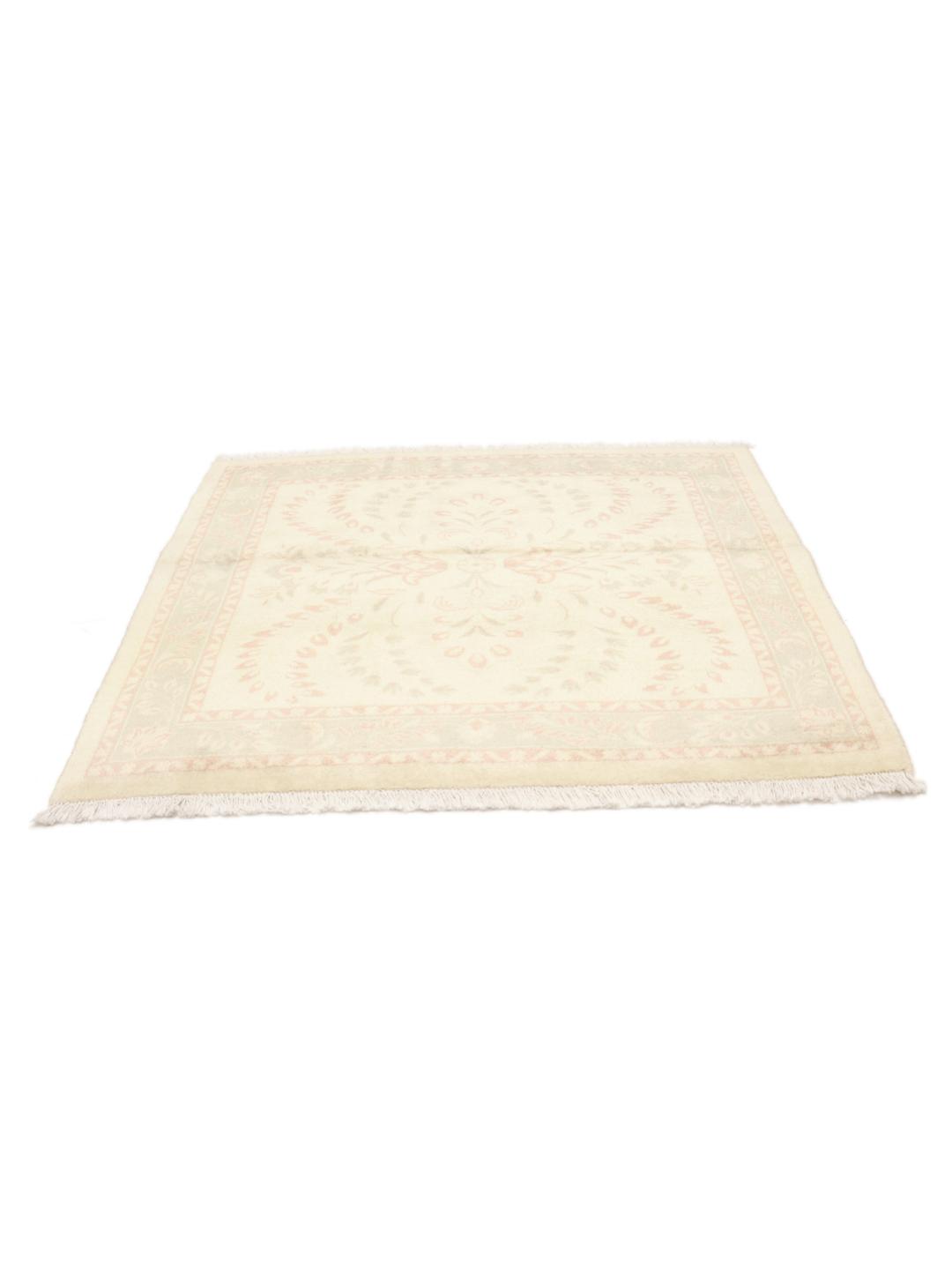Handgeknoopt Tabriz wollen tapijt in beige en lichtgroen