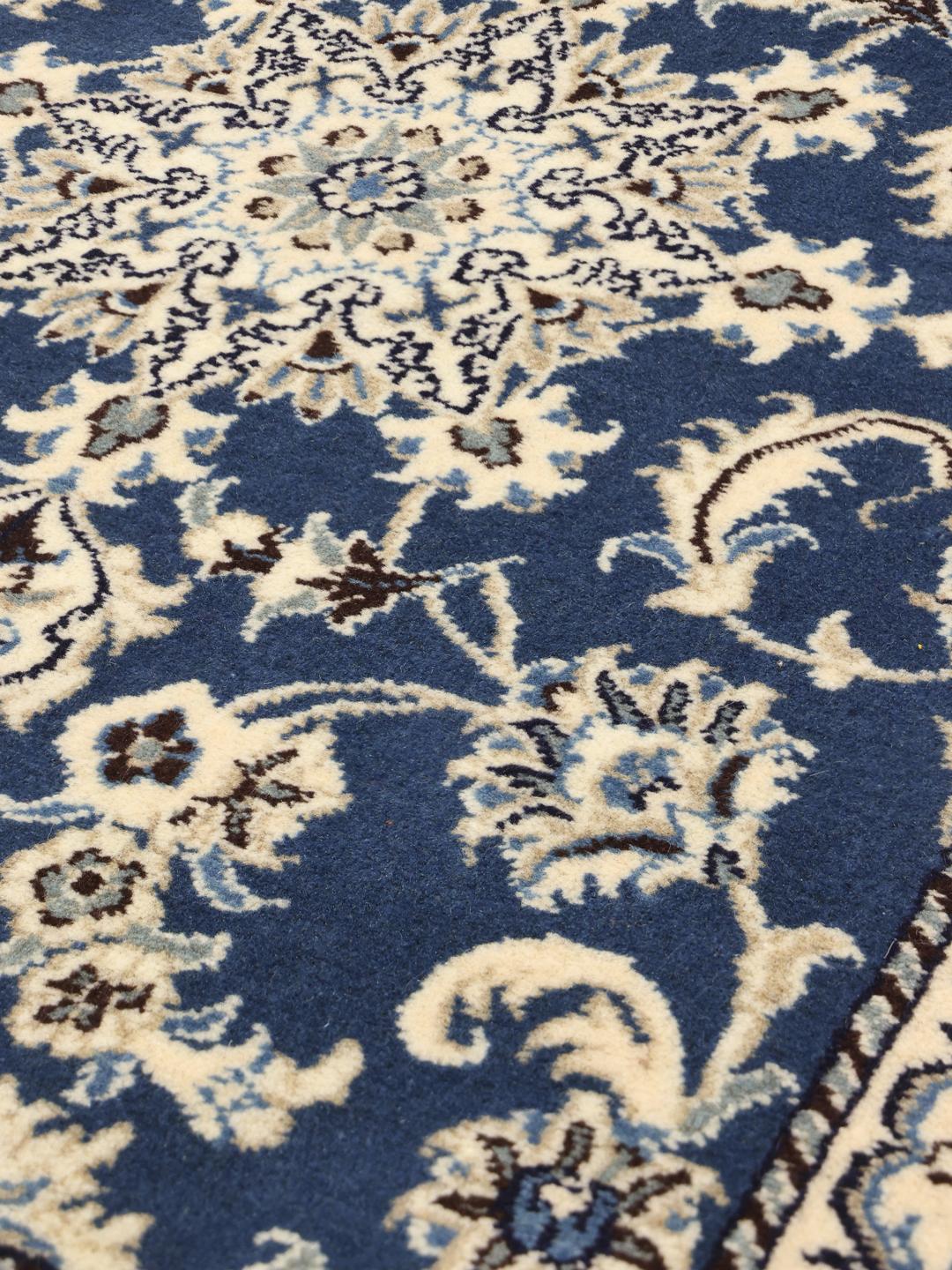 Handgeknoopte blauwe Nain loper met bloemmotieven uit het Midden-Oosten