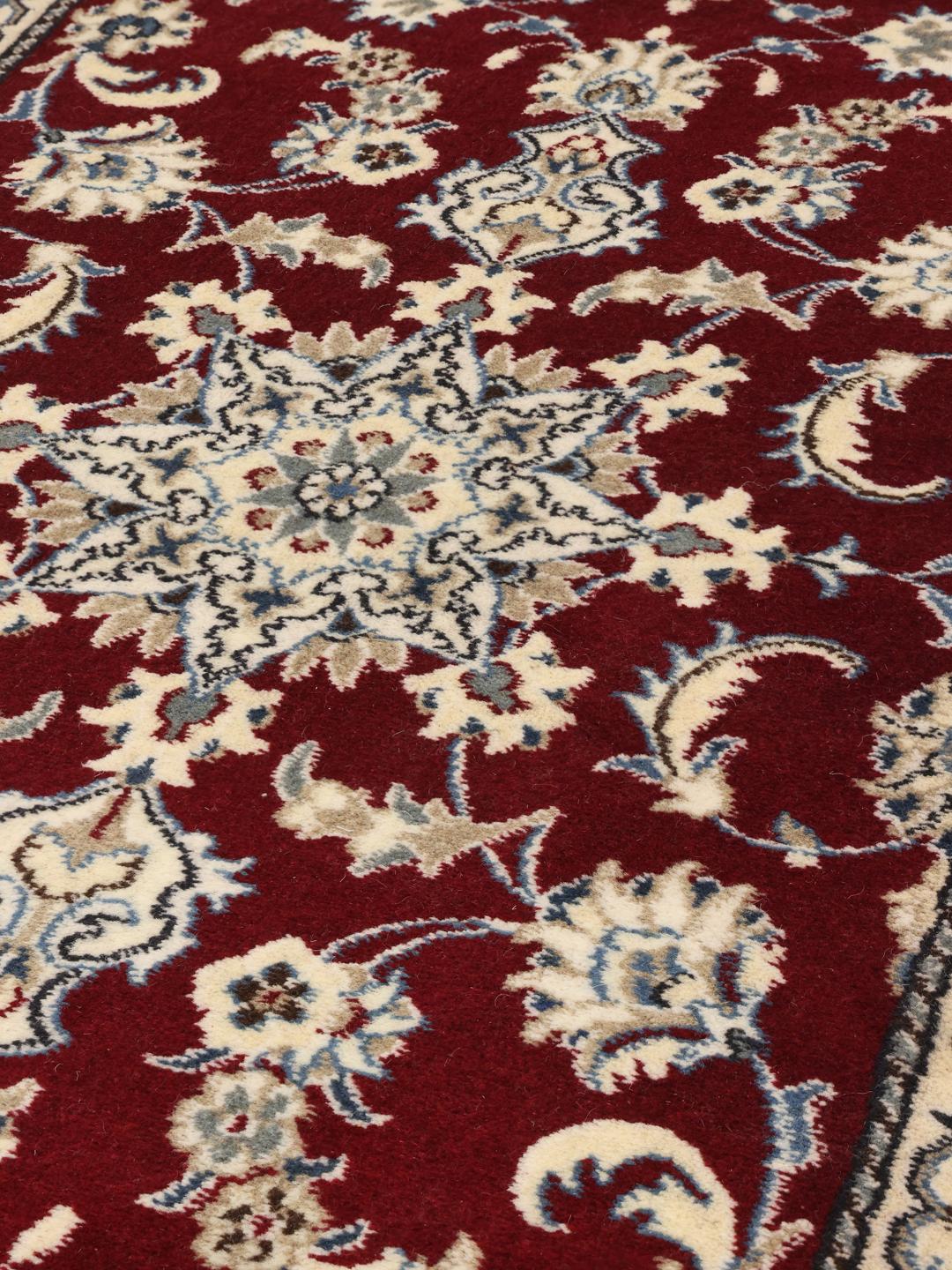 Handgeknoopte Nain loper in dieprood met bloemmotieven
