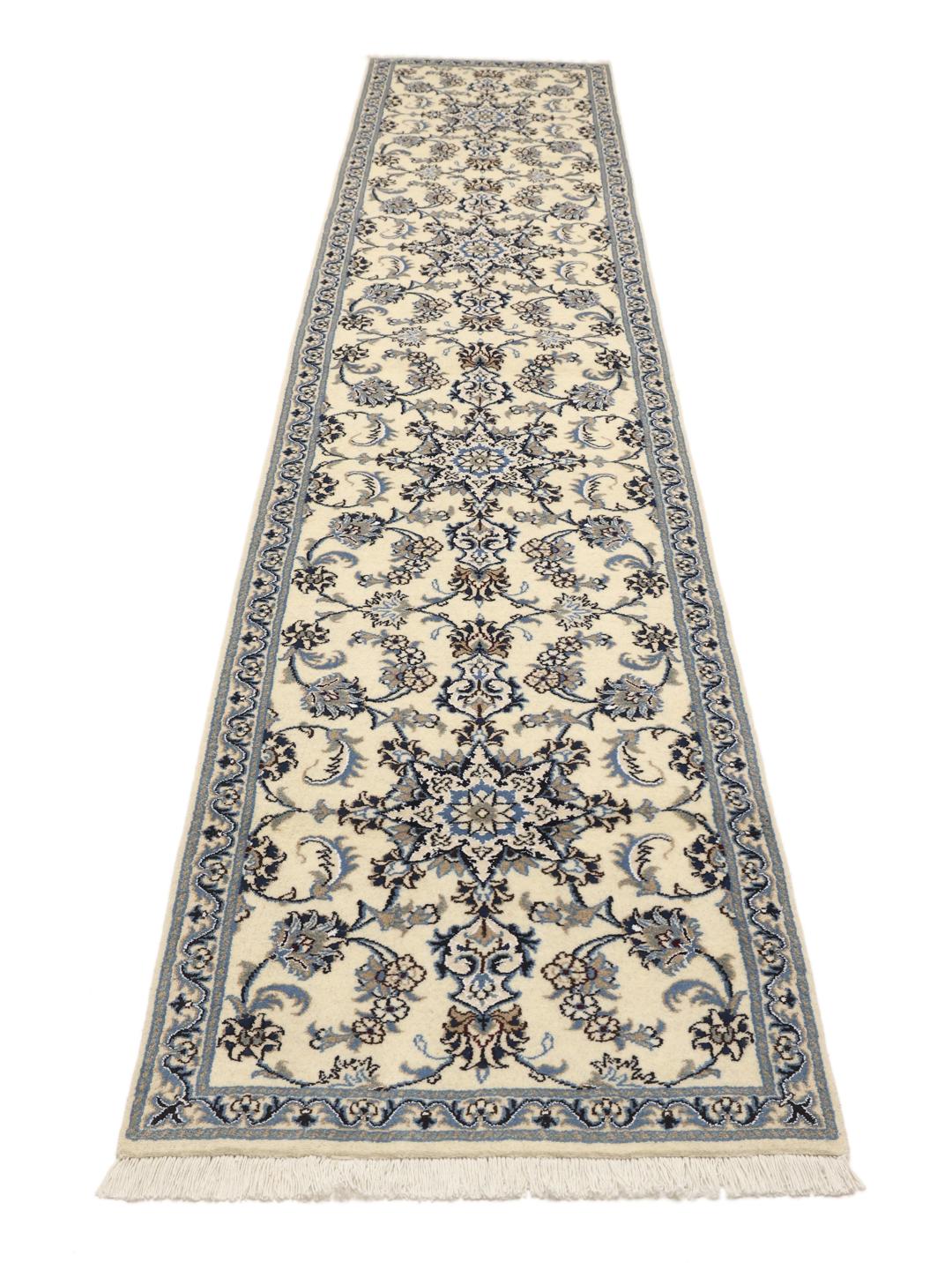 Hand-knotted Nain runner with floral patterns in beige and blue