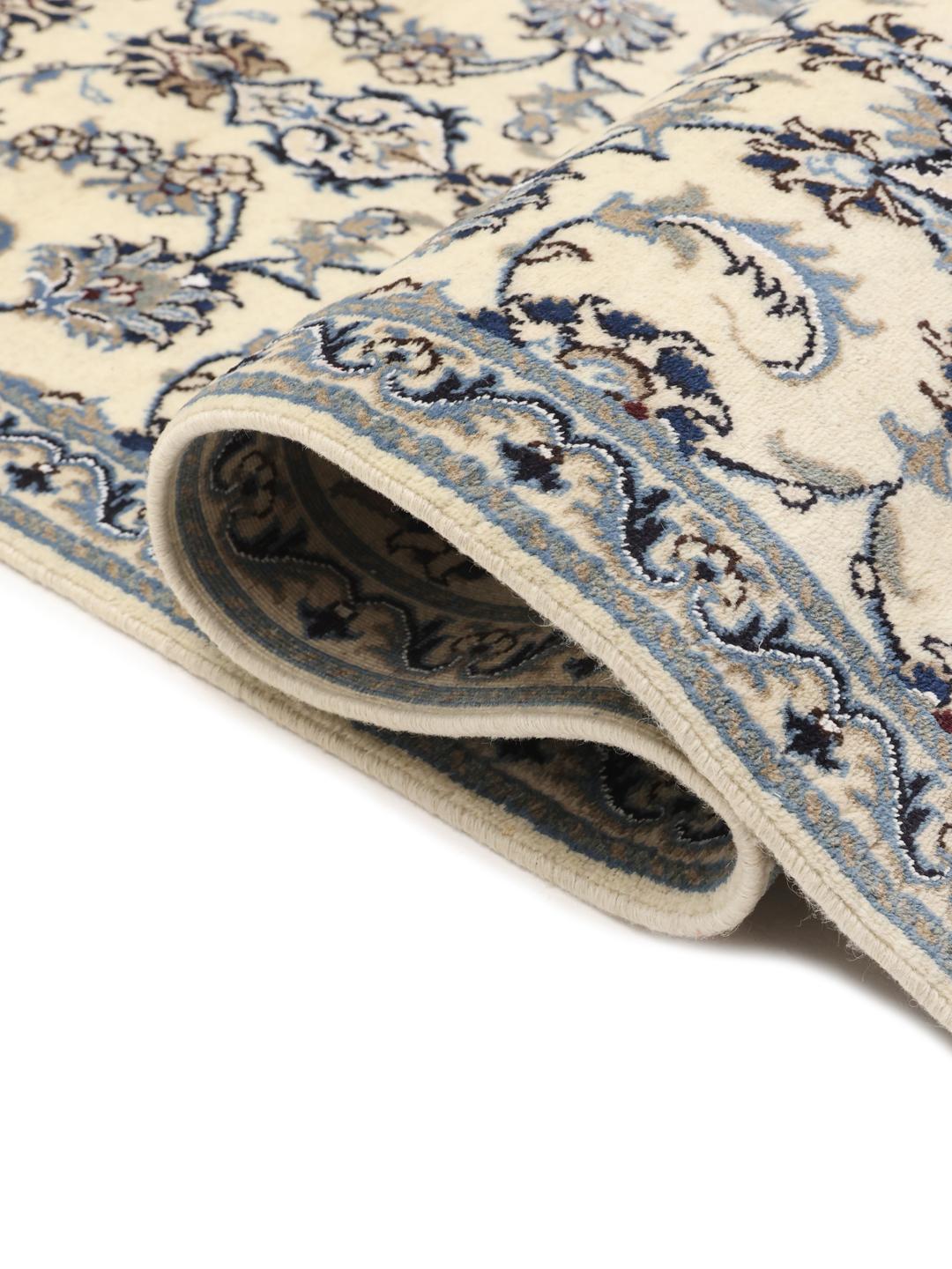 Hand-knotted Nain runner with floral patterns in beige and blue