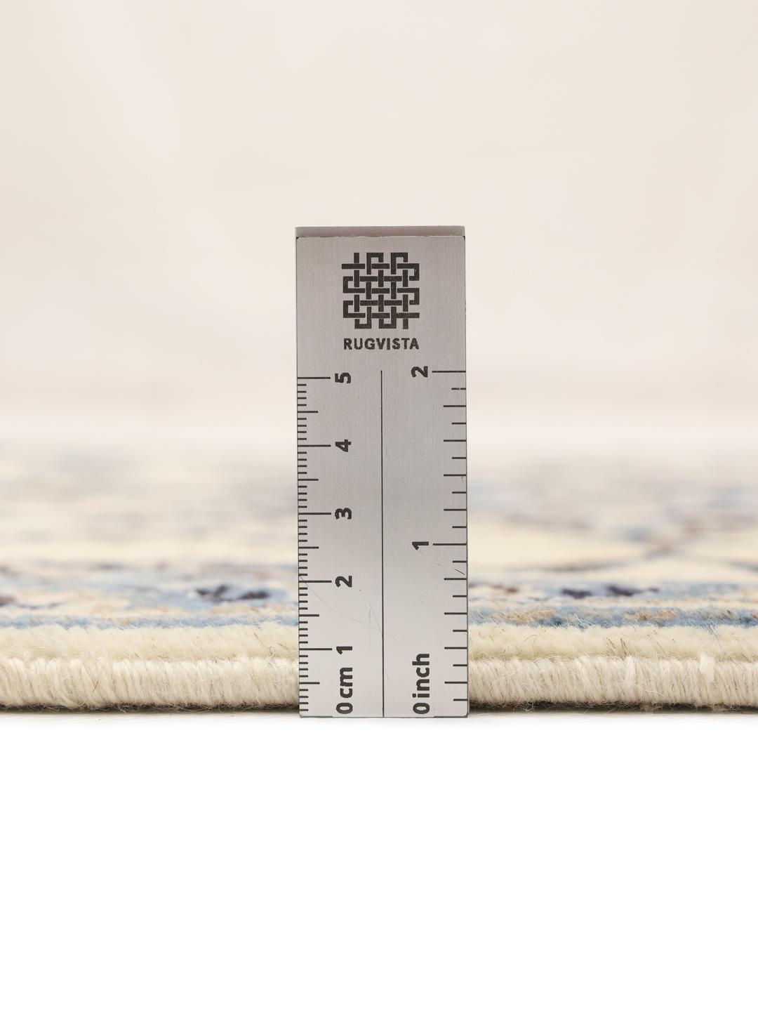 Hand-knotted Nain runner with floral patterns in beige and blue