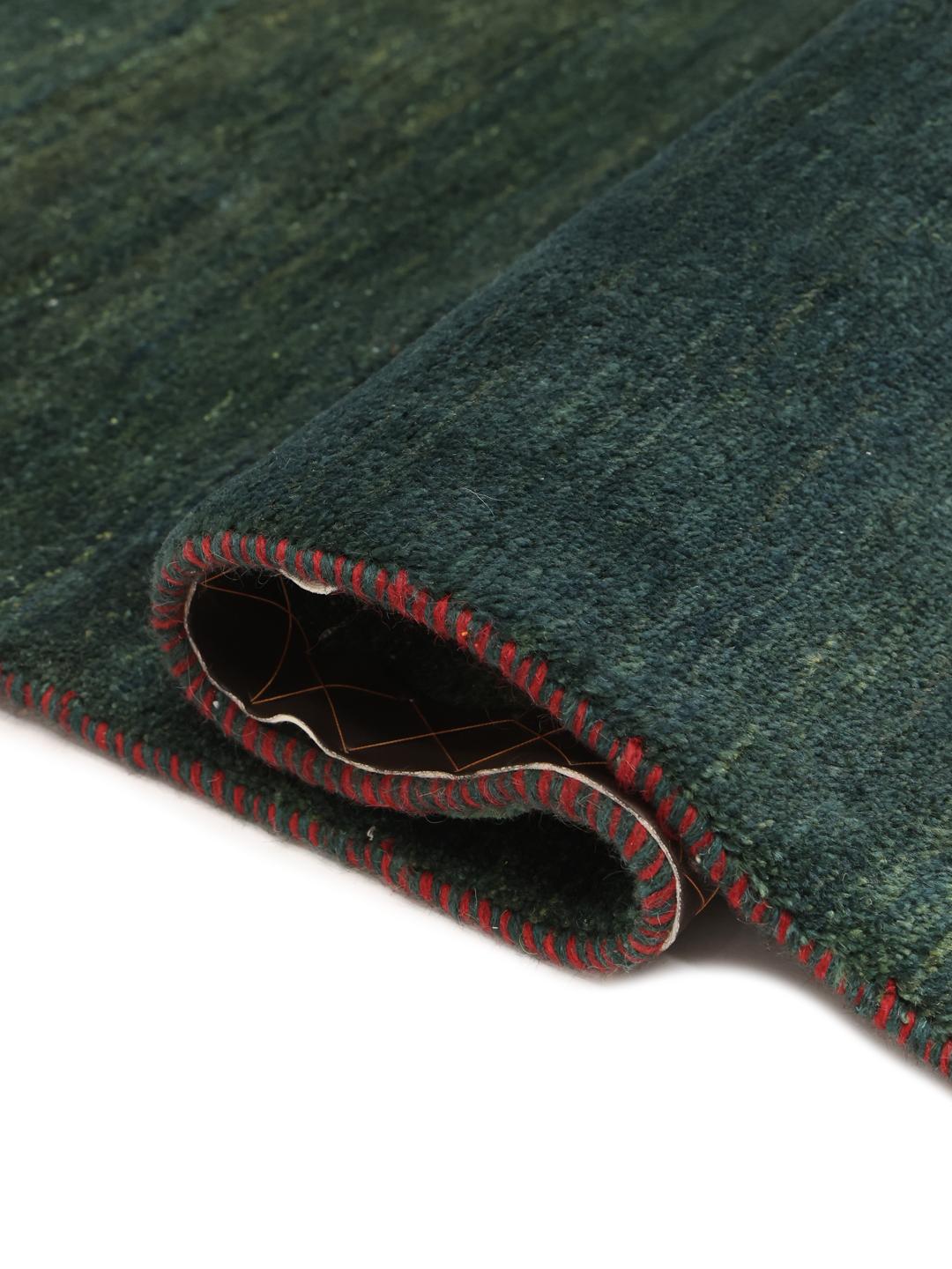 Håndknyttet Gabbeh-tæppe fra Mellemøsten med et mørkegrønt og lysegrønt ombre-design.