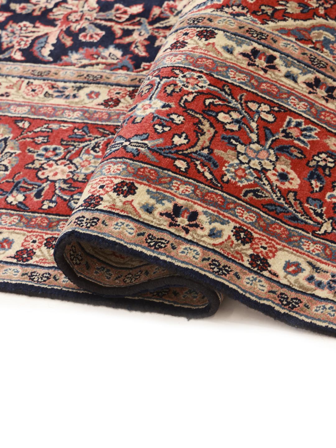 Hand-knotted Hamadan rug from the Middle East in dark-blue and red