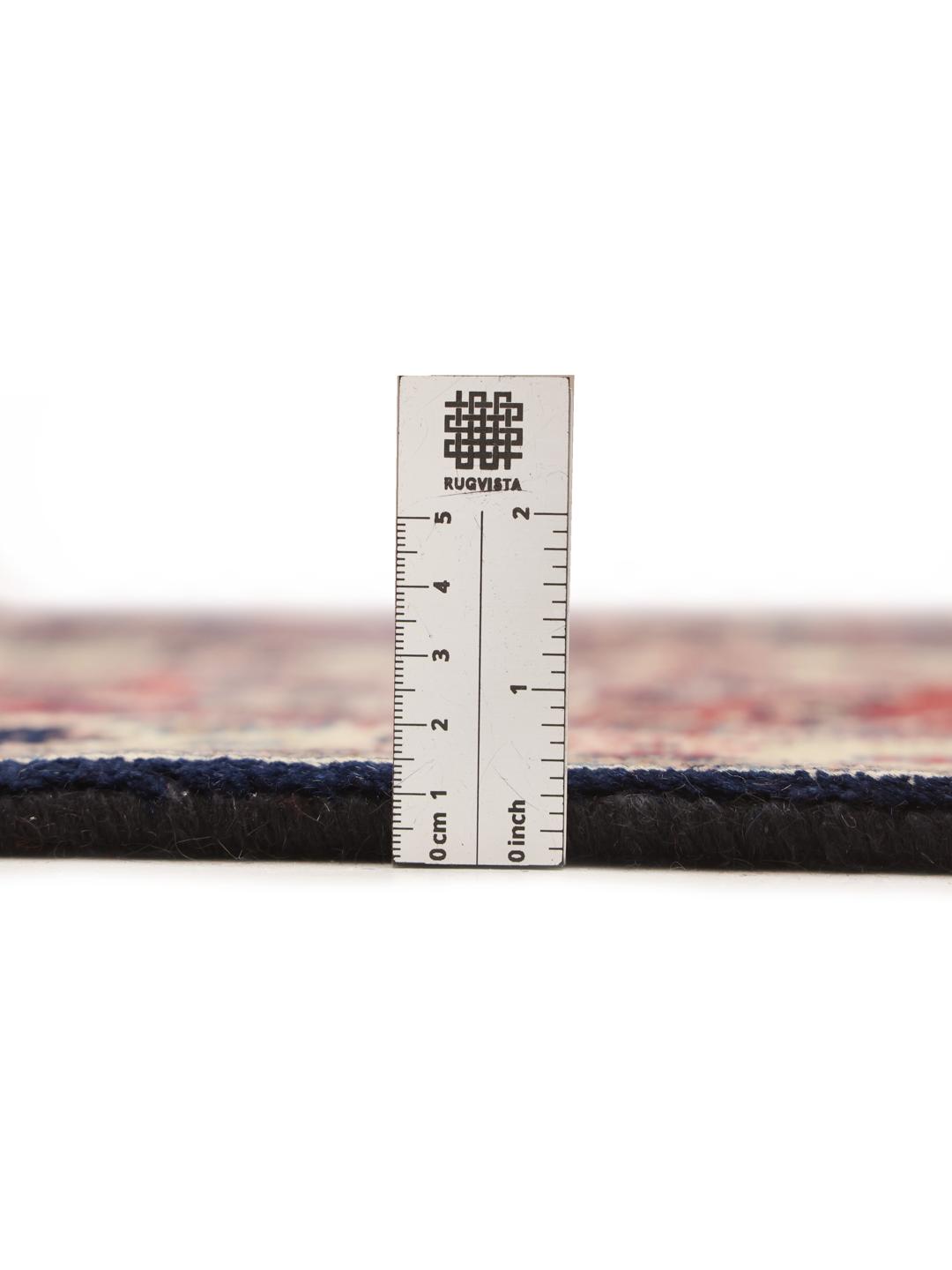 Hand-knotted Hamadan rug from the Middle East in dark-blue and red