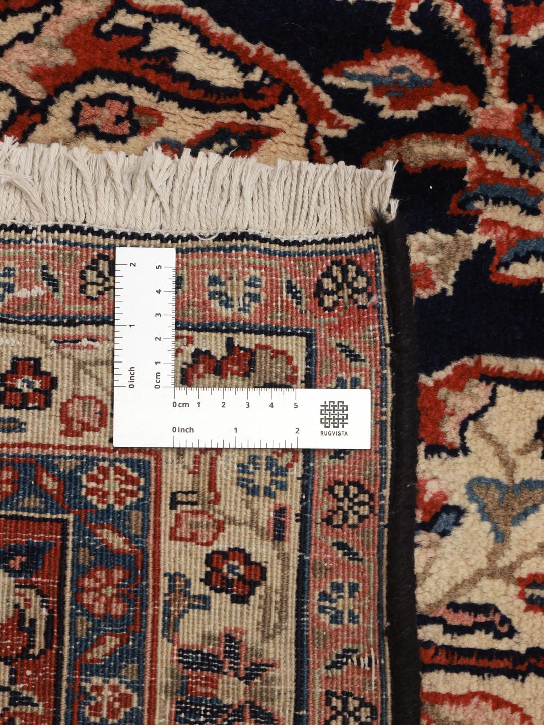 Hand-knotted Hamadan rug from the Middle East in dark-blue and red