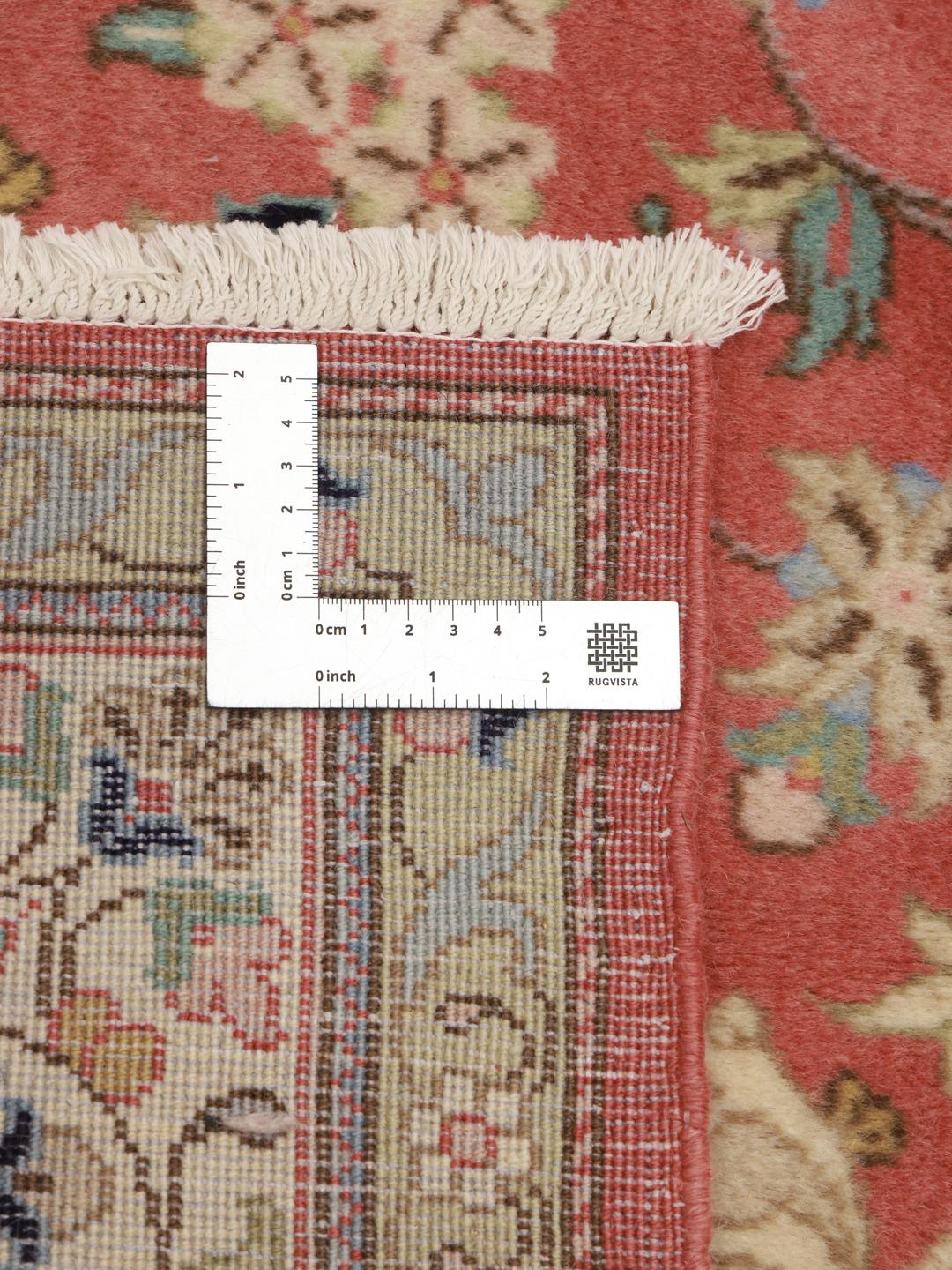 Handgeknoopt Nain vloerkleed in roze en beige