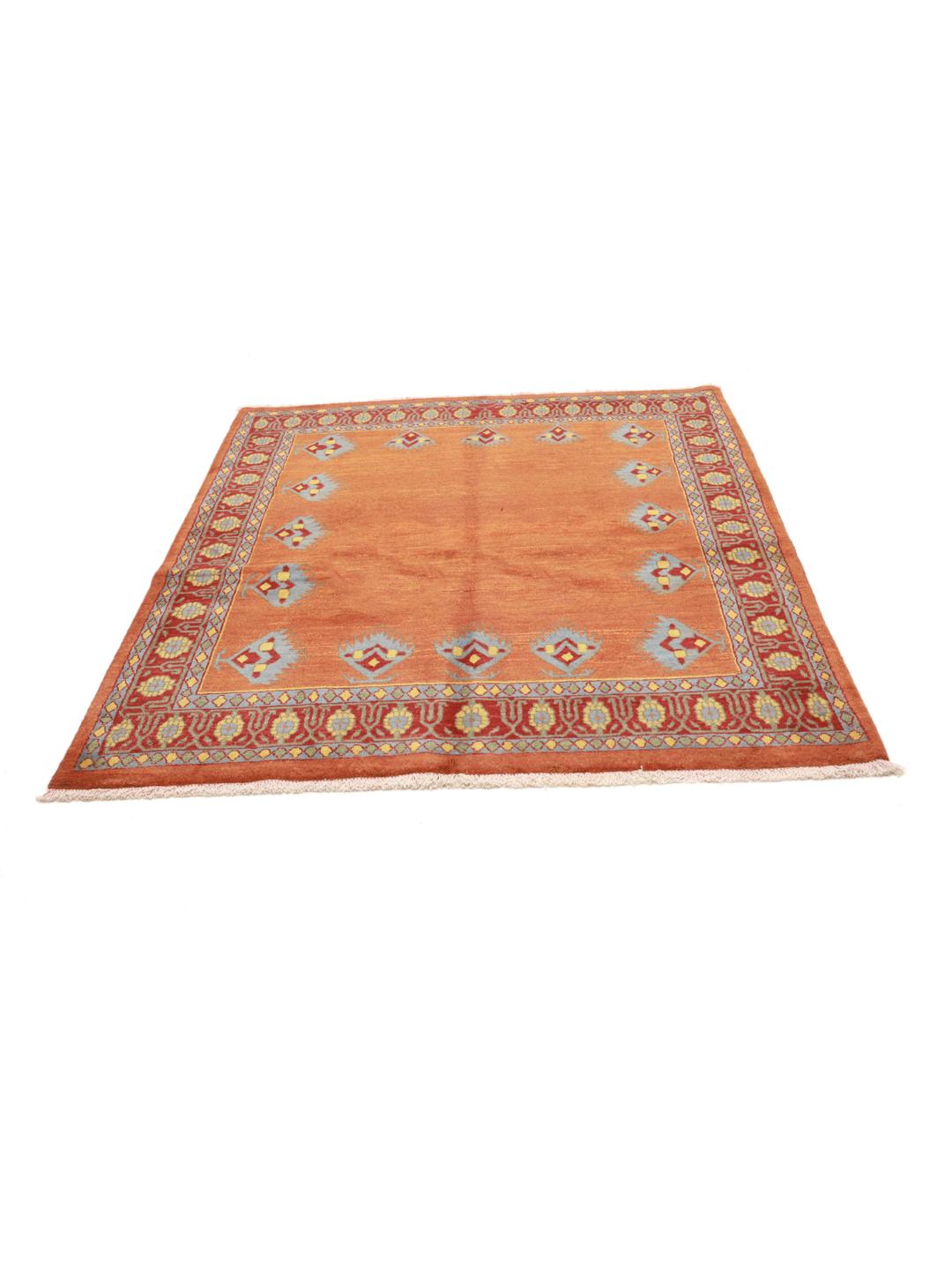 Hand-knotted Loribaft rug with a red field and geometric motifs