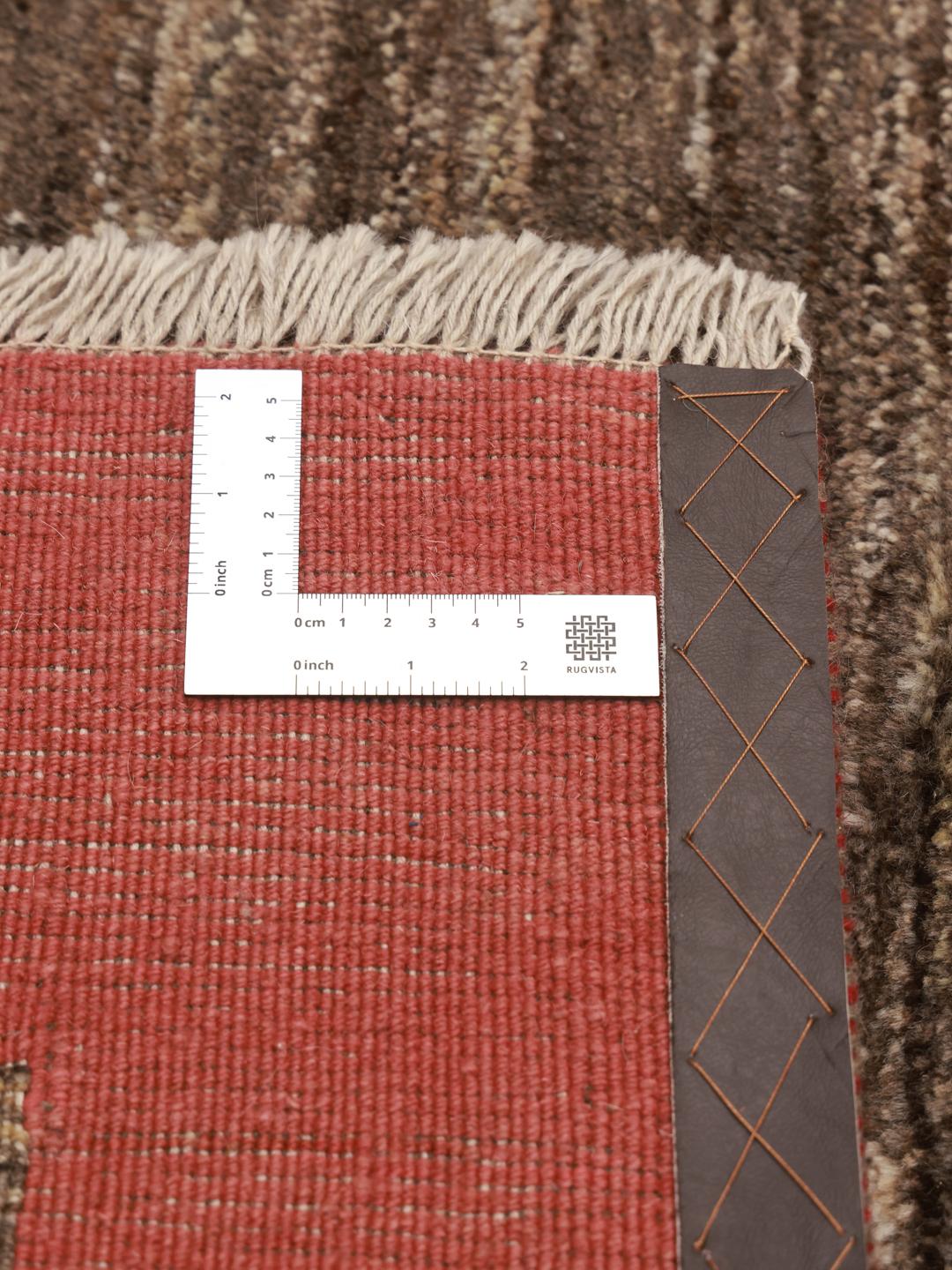 Tapis Shabargan Gabbeh noué à la main dans des tons rouge profond et marron
