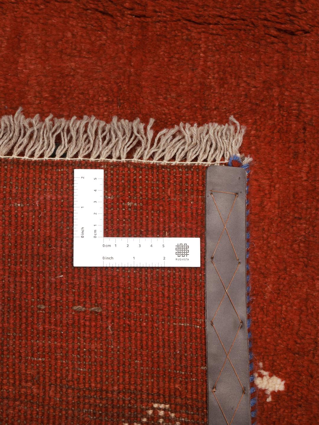 Tapis Gabbeh noué à la main originaire du Moyen-Orient dans une couleur rouge foncé vibrante