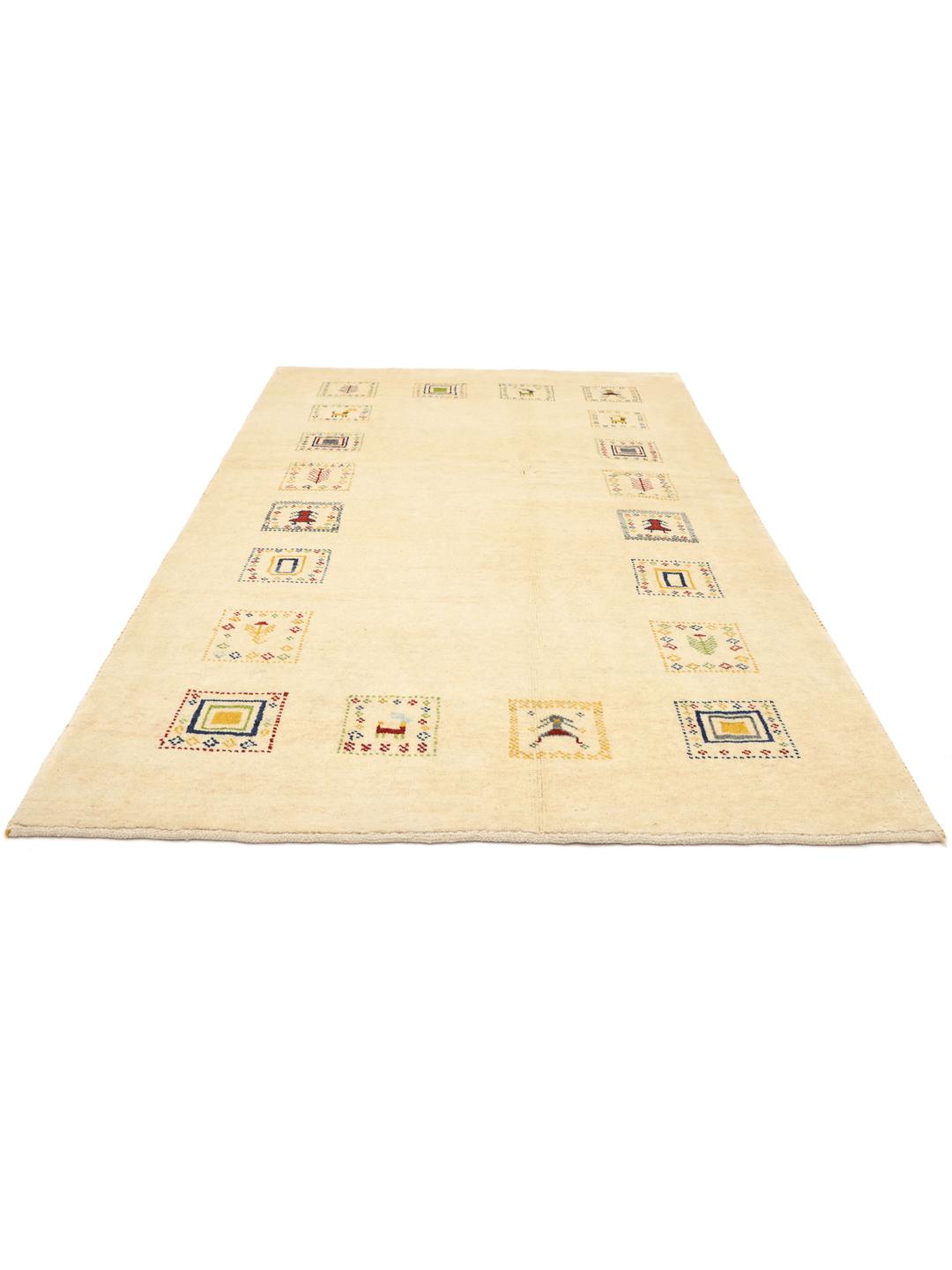Hand knotted Gabbeh rug from the Middle East with a beige background and colourful motifs