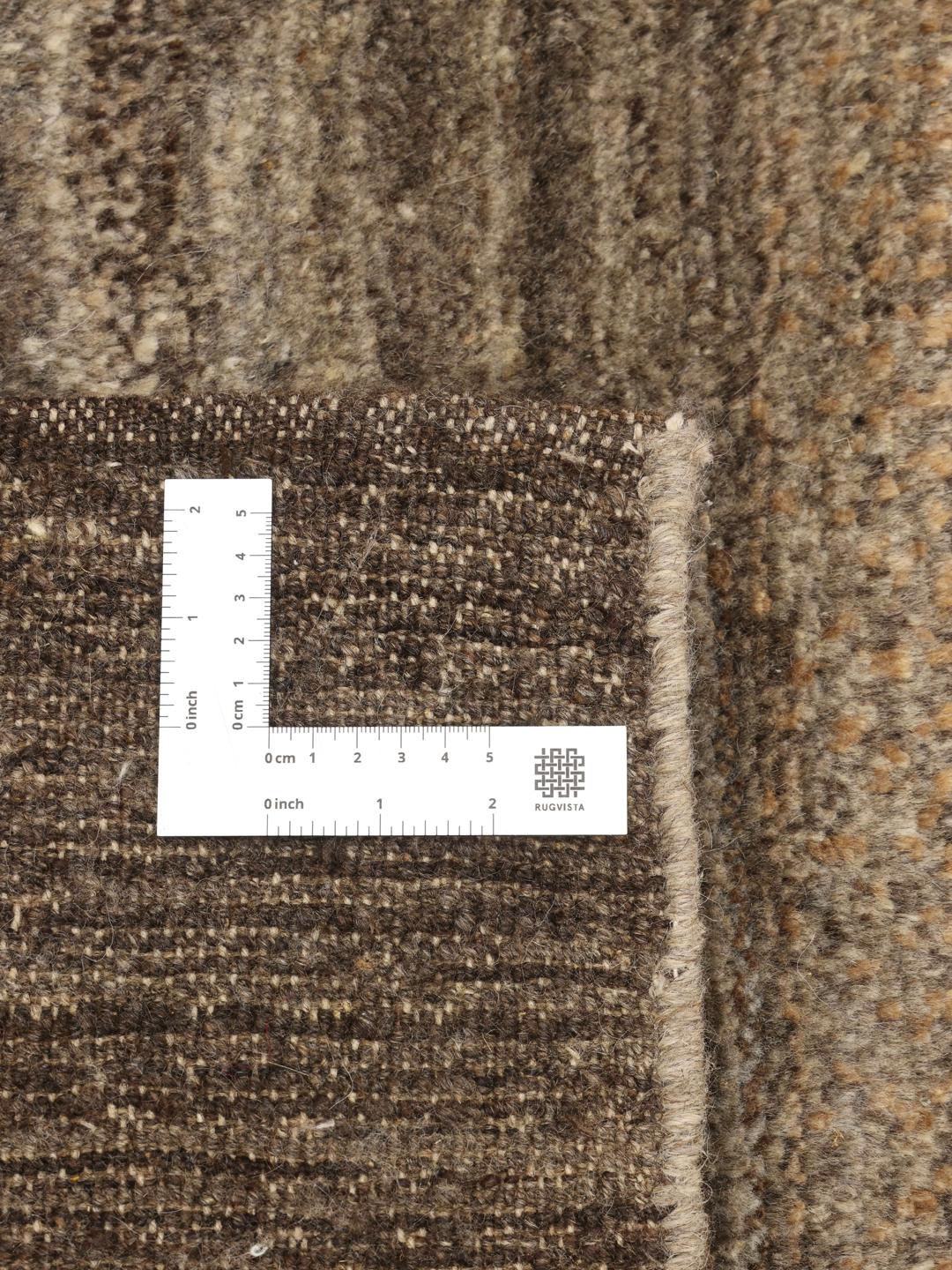 Hand-knotted Middle Eastern rug in brown tones