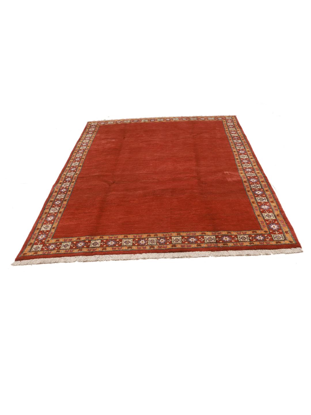 Handgeknoopt Perzisch vloerkleed in donkerrood met een decoratieve rand