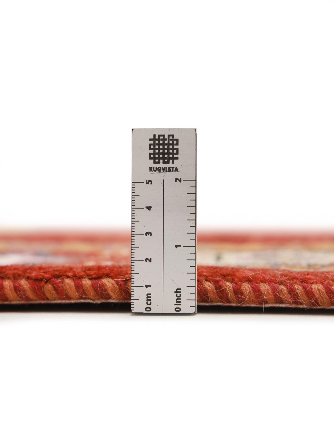 Handgeknoopt Perzisch vloerkleed in donkerrood met een decoratieve rand