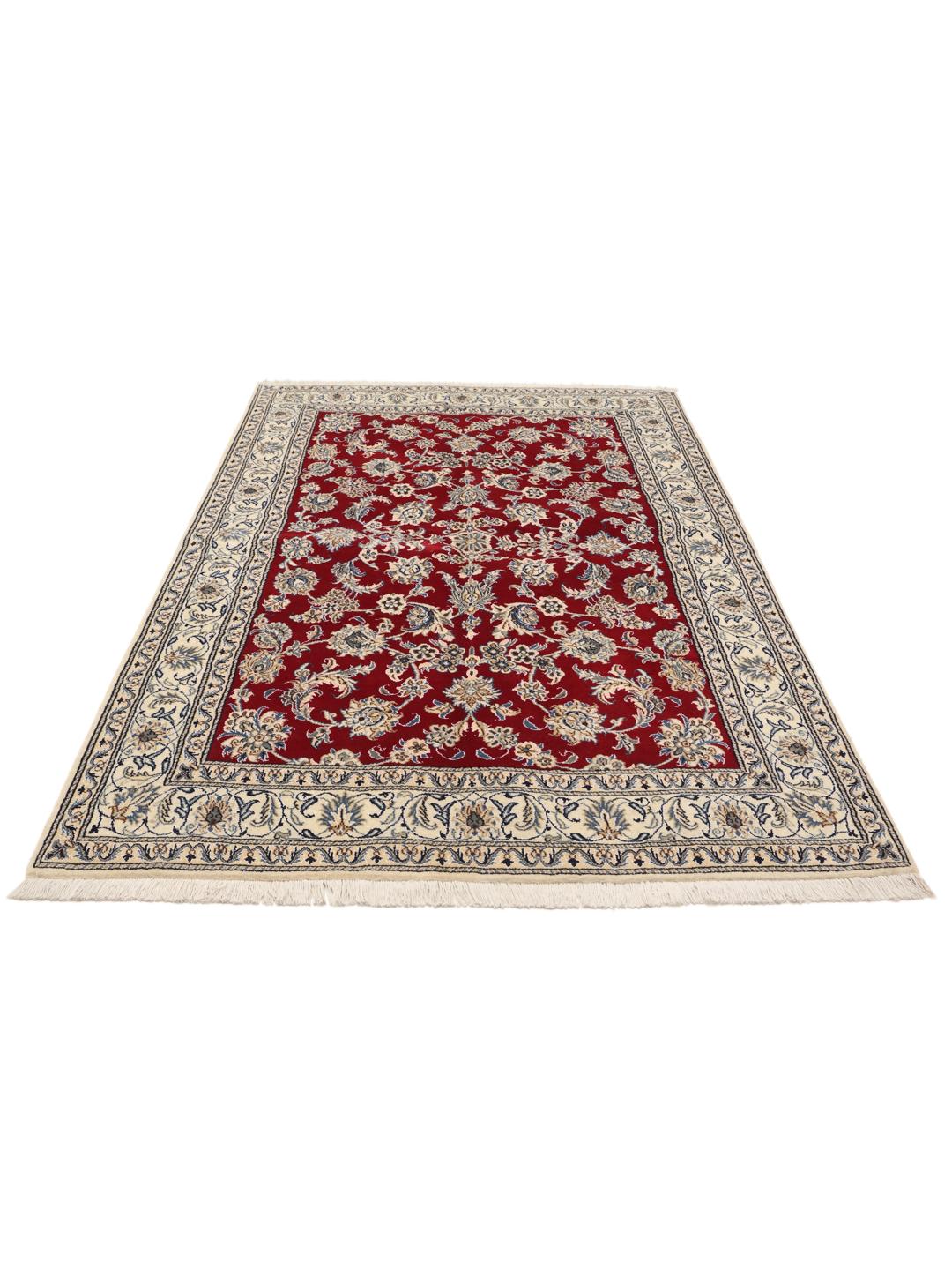 Hand-knotted Nain rug from the Middle East in deep red with floral patterns
