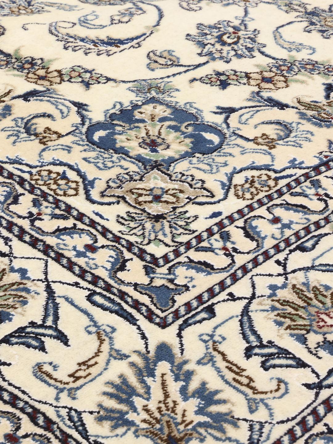 Hand-knotted Nain rug from the Middle East in beige and blue