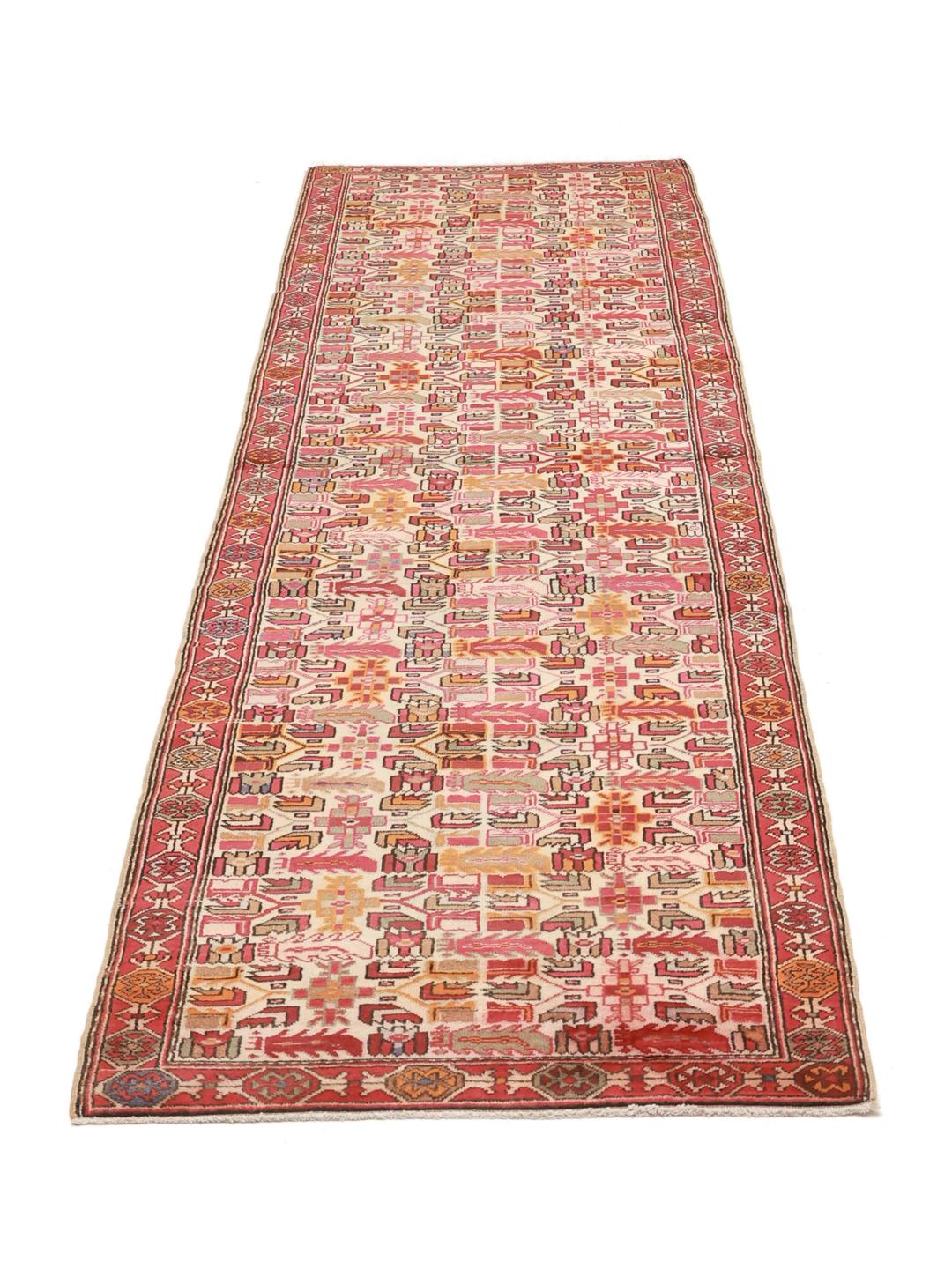 Handgeknoopte Ardebil-loper met geometrische motieven in veelkleurige wol uit het Midden-Oosten.