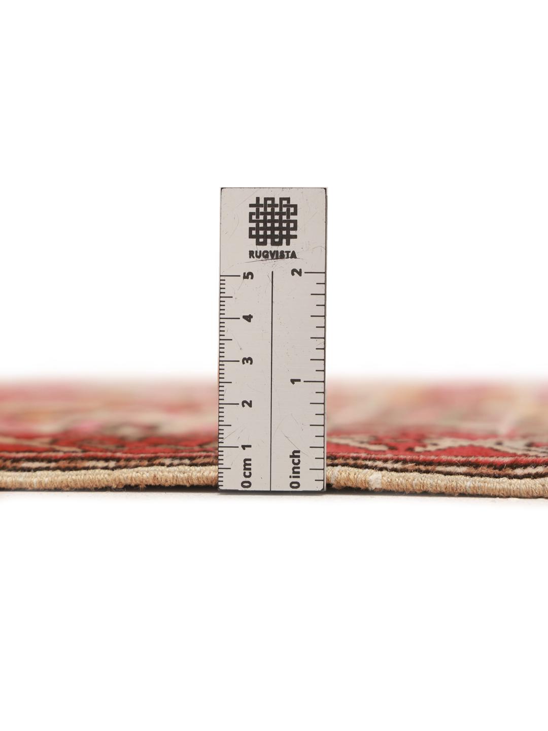 Handgeknoopte Ardebil-loper met geometrische motieven in veelkleurige wol uit het Midden-Oosten.