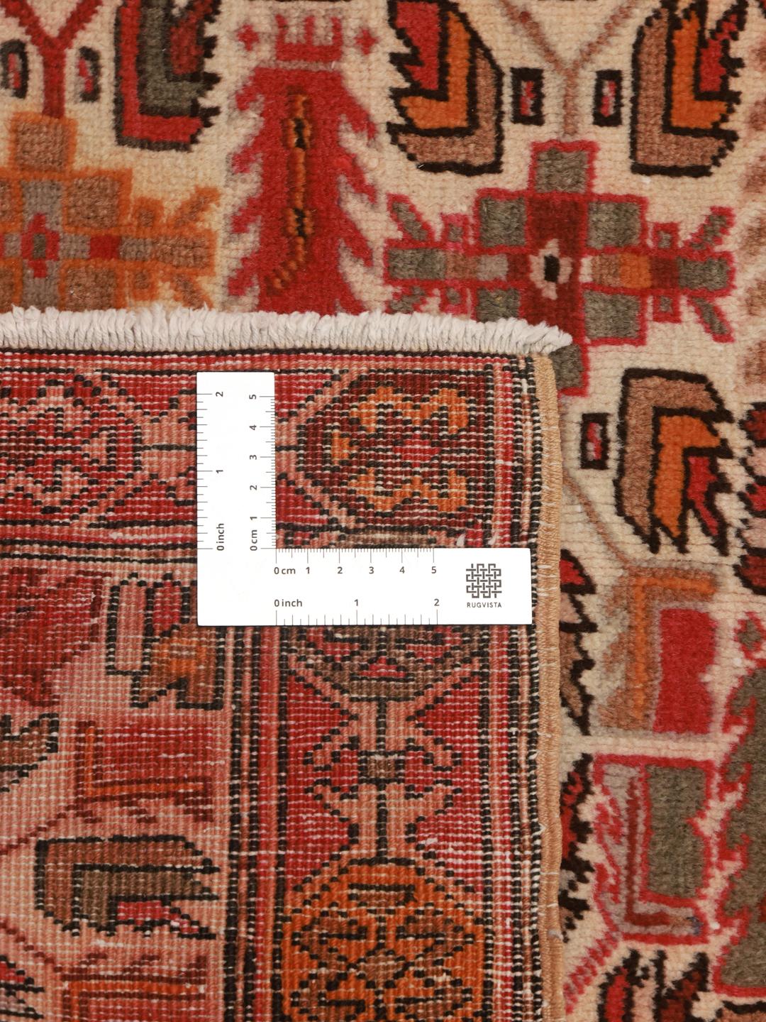 Handgeknoopte Ardebil-loper met geometrische motieven in veelkleurige wol uit het Midden-Oosten.
