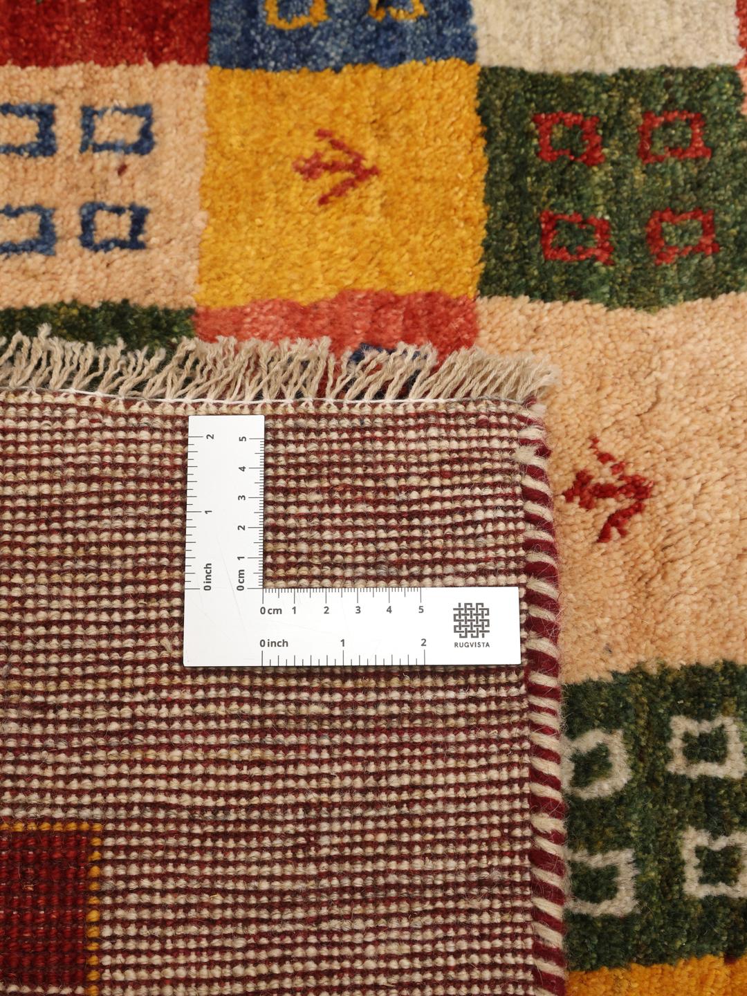 Handgeknoopt Loribaft-tapijt met meerkleurige geometrische blokken en een rode dambordrand uit het Midden-Oosten
