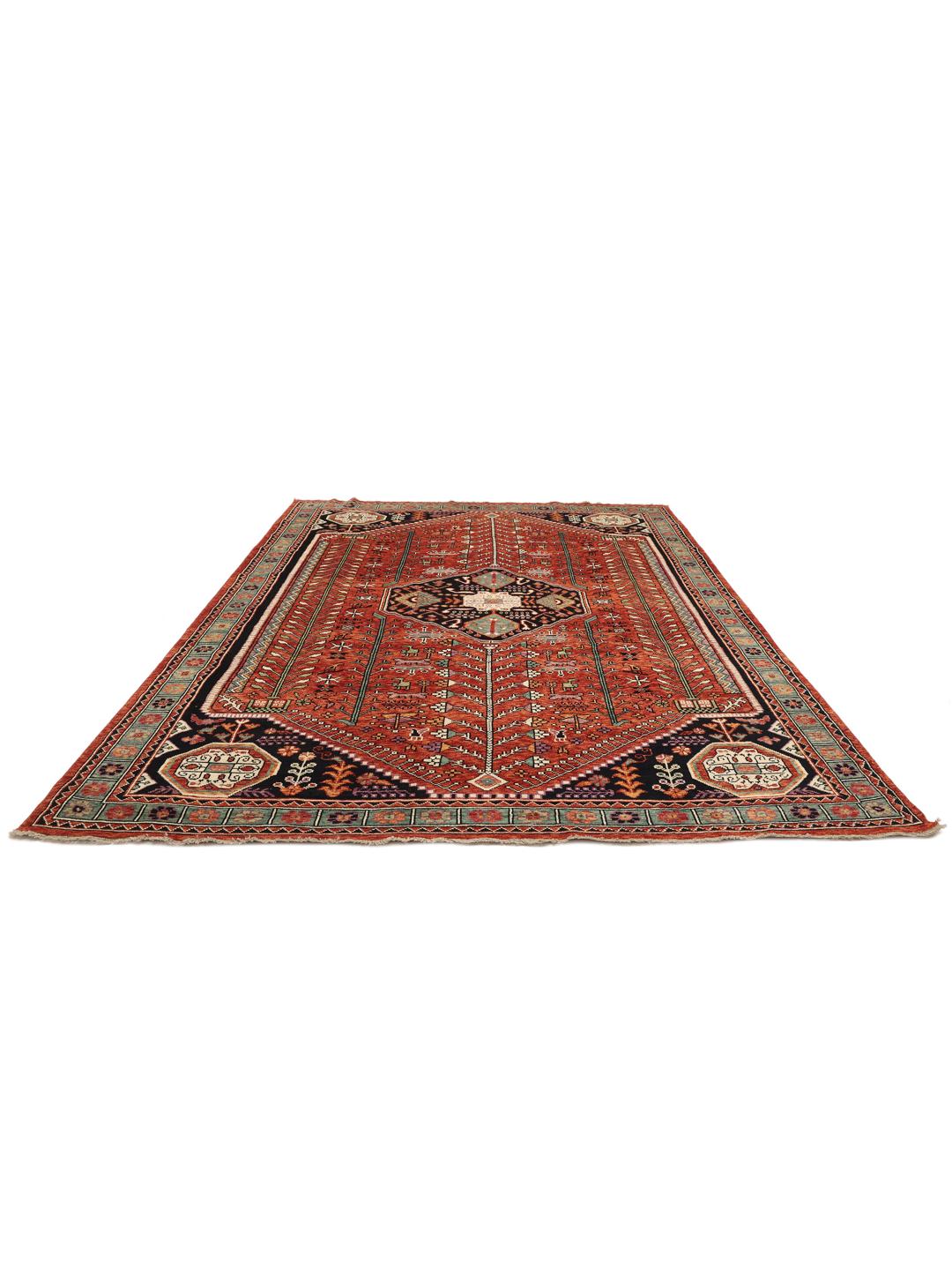 Handgeknoopt Kazak-tapijt uit Afghanistan met een gedurfd rood en donkerblauw geometrisch patroon.