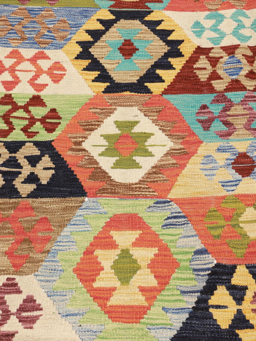 Hand-woven Afghan Kelim rug in vibrant multicolor geometric patterns