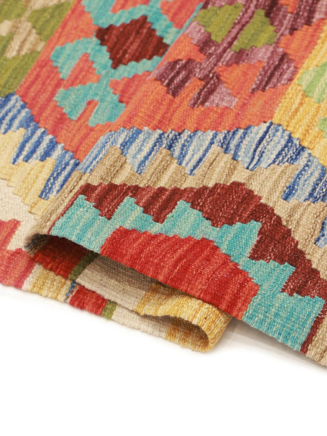 Hand-woven Afghan Kelim rug in vibrant multicolor geometric patterns