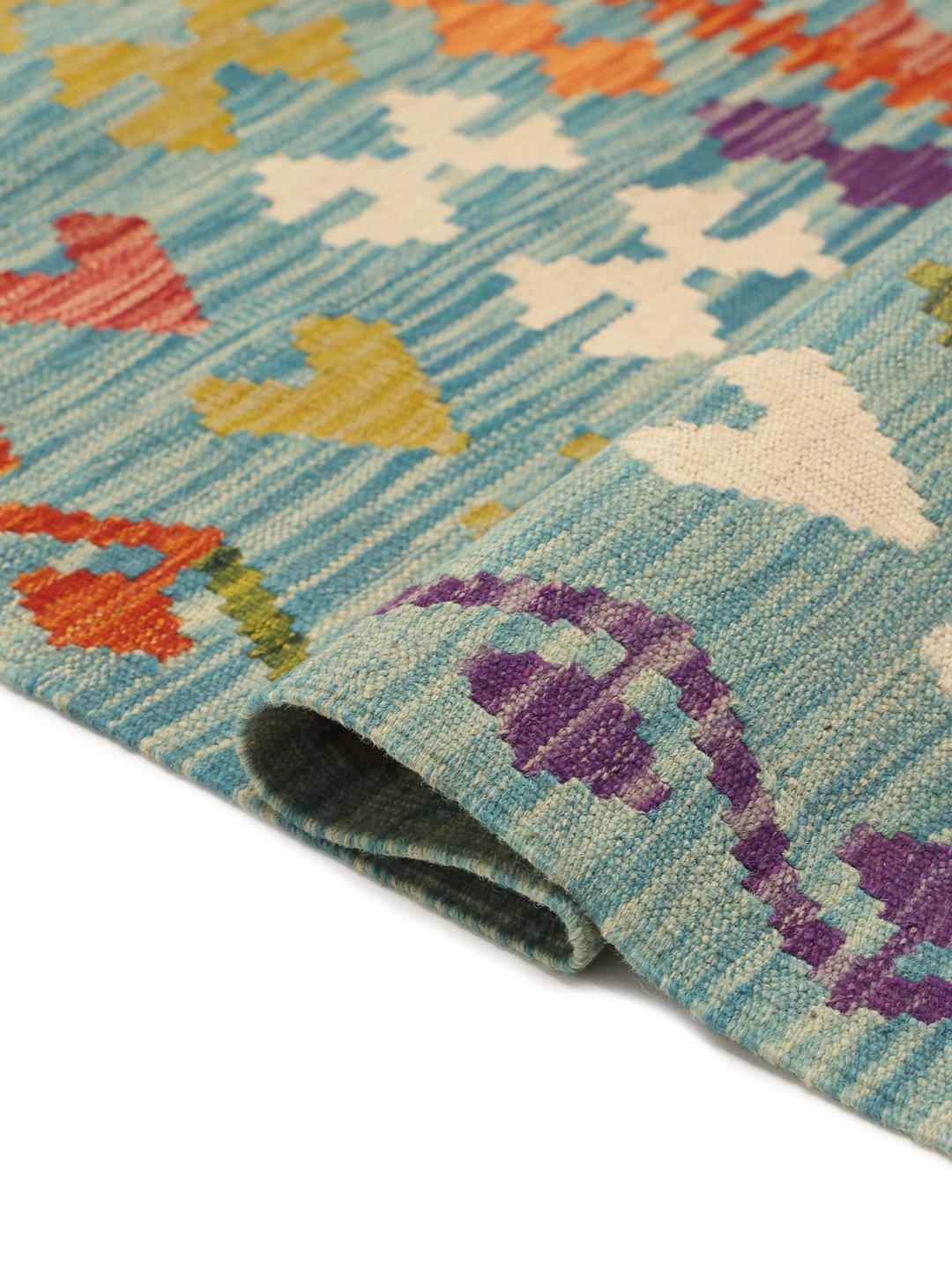 Hand-woven Afghan Kelim rug with a vibrant geometric pattern in blue and multi-coloured accents.