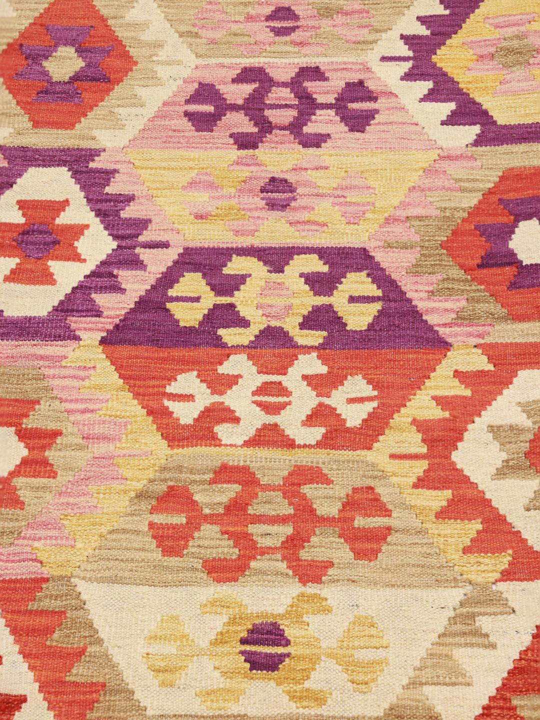 Handgeweven Afghaans Kelim-tapijt met een levendig geometrisch patroon in multicolor