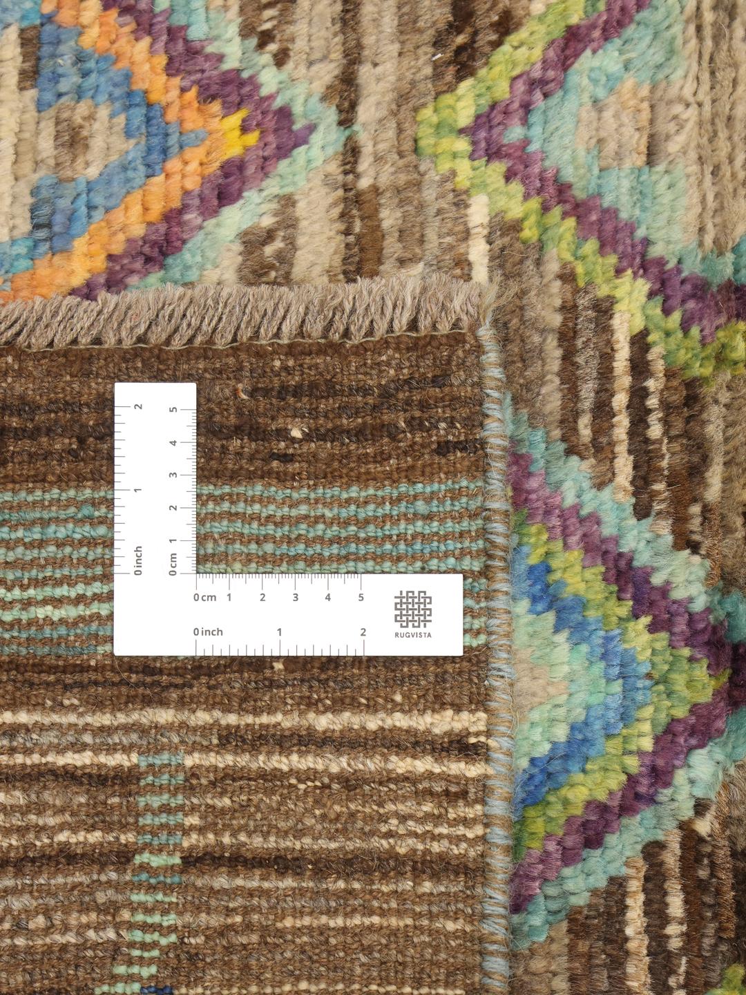 Handgeknoopt Afghaans tapijt met een levendig veelkleurig geometrisch patroon