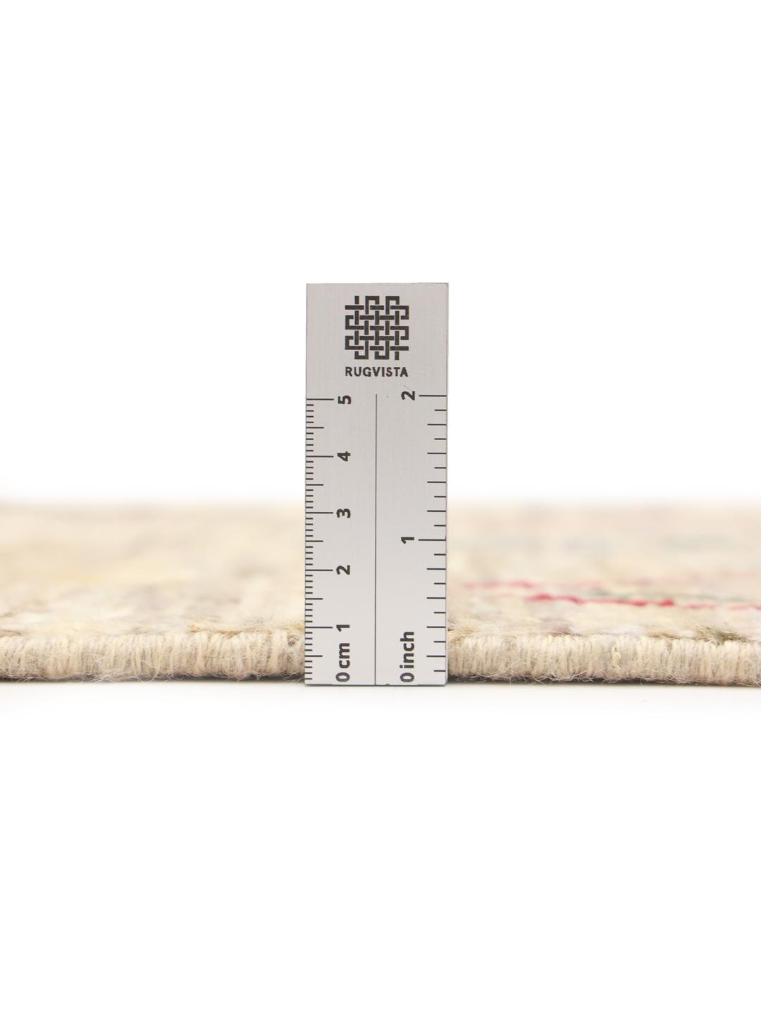 Hand-knotted Afghan rug with a beige field and colourful geometric motifs