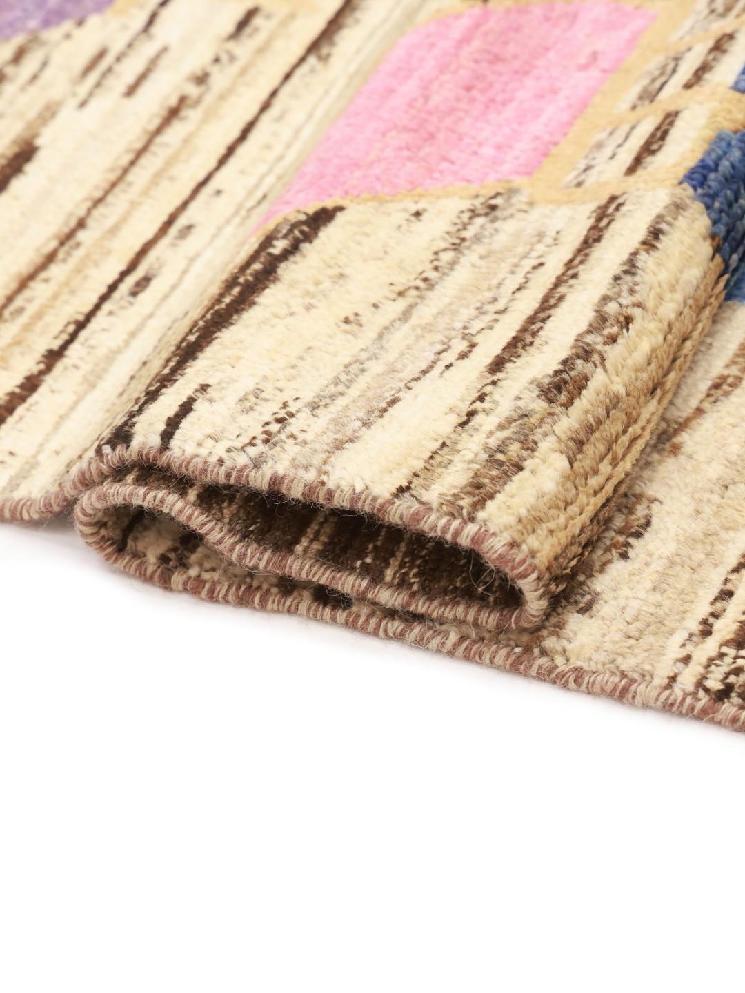 Hand-knotted Afghan rug with colourful artistic motifs on a brown background