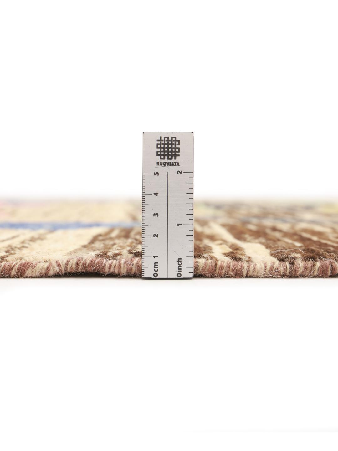 Hand-knotted Afghan rug with colourful artistic motifs on a brown background