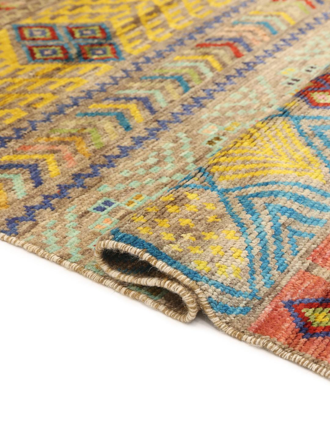 Handgeknoopt Afghaans kleed met levendige geometrische patronen in meerkleurige wol