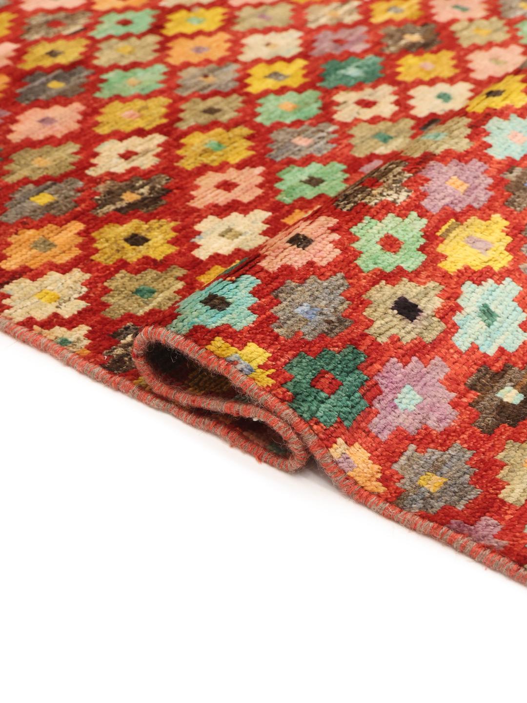 Tapis couloir afghan noué à la main avec un motif géométrique multicolore en losanges