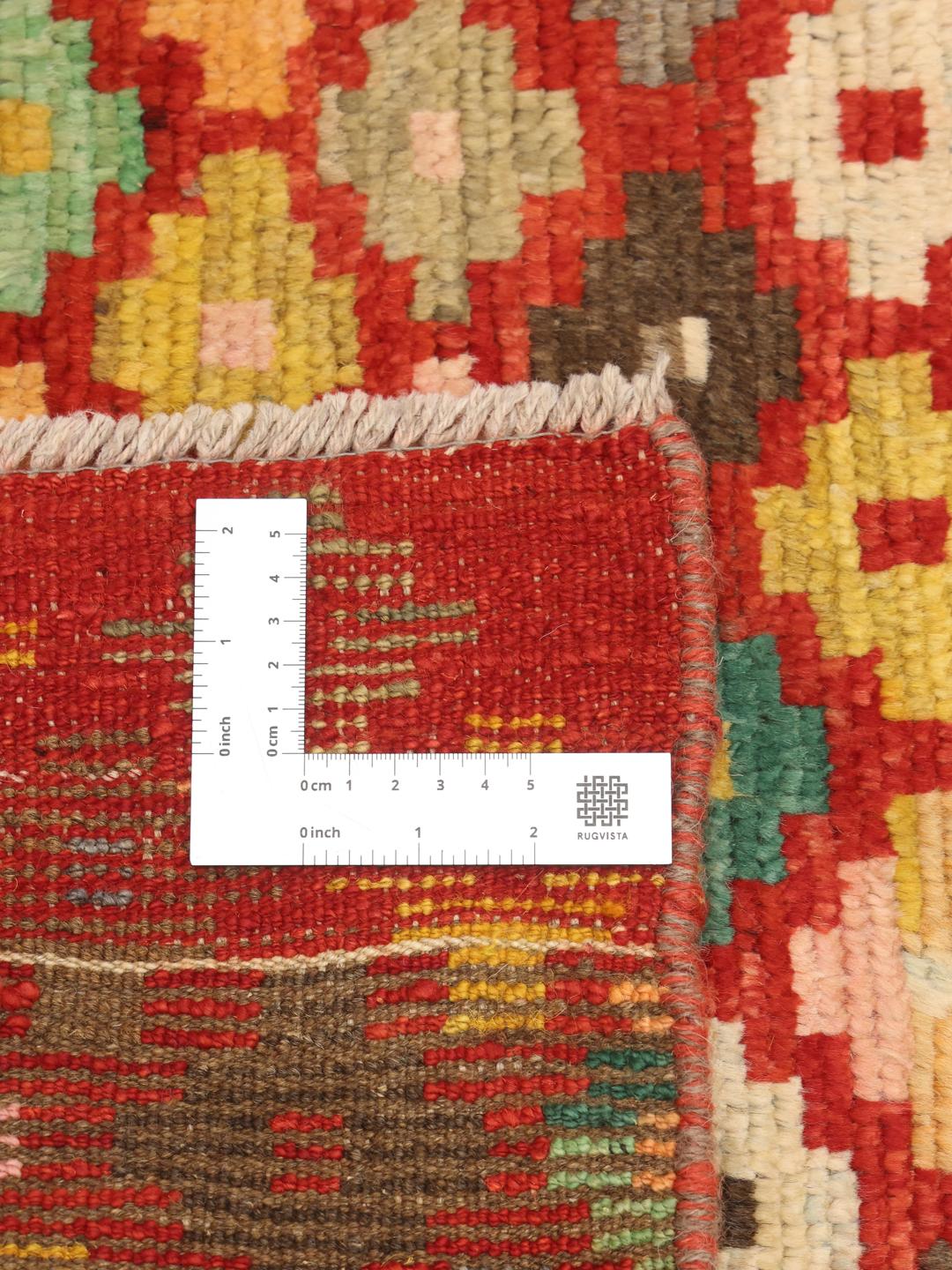 Tapis couloir afghan noué à la main avec un motif géométrique multicolore en losanges
