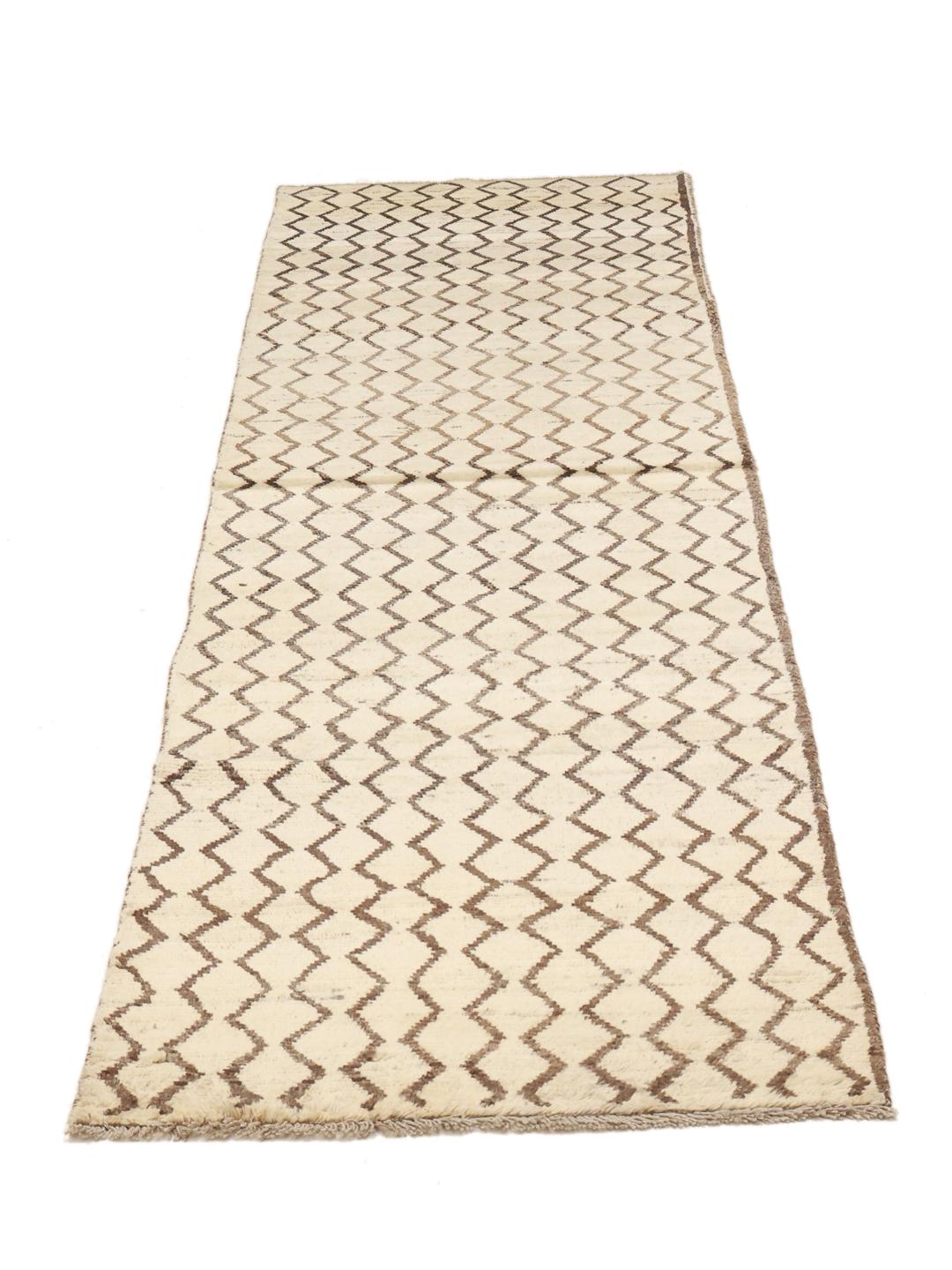 Håndknyttet løber i Berber-stil fra Afghanistan i beige med et geometrisk mønster.