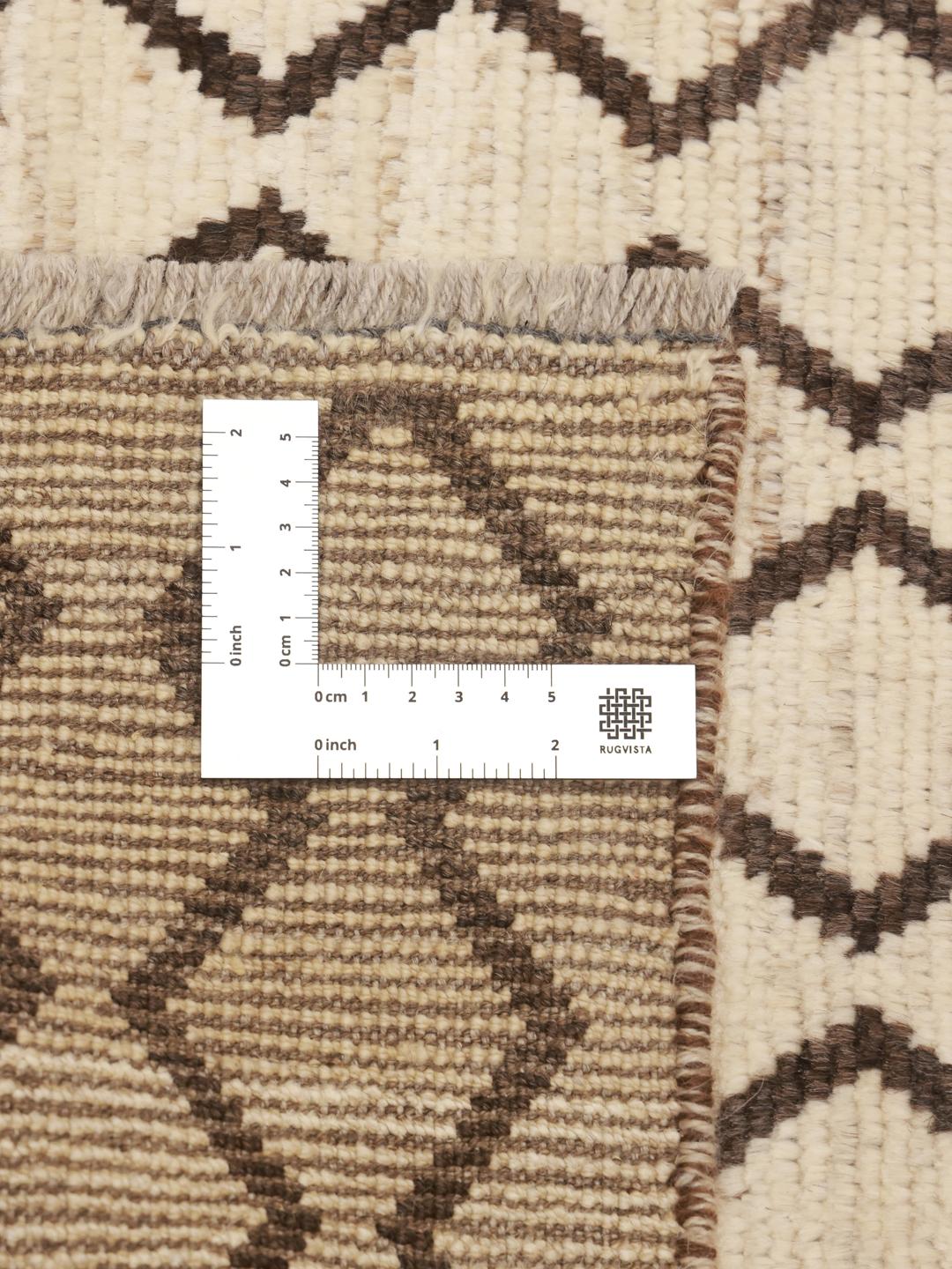 Håndknyttet løber i Berber-stil fra Afghanistan i beige med et geometrisk mønster.