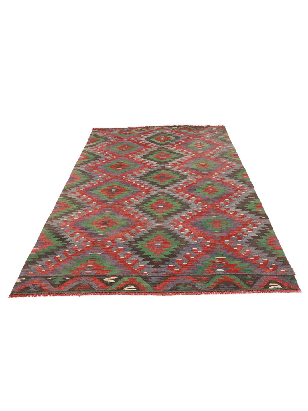 Vintage kelimtapijt uit het Midden-Oosten met geometrische patronen in veelkleurige wol