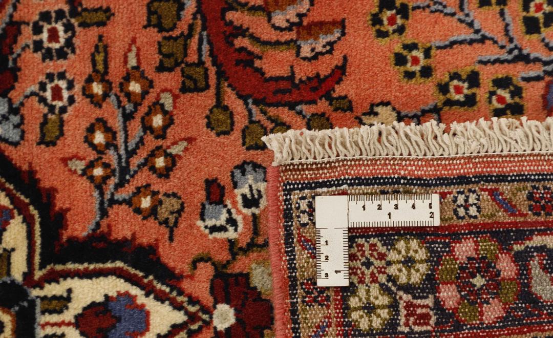 Handgeknoopt Rudbar loper tapijt met bloemmotieven in roze en meerkleurig