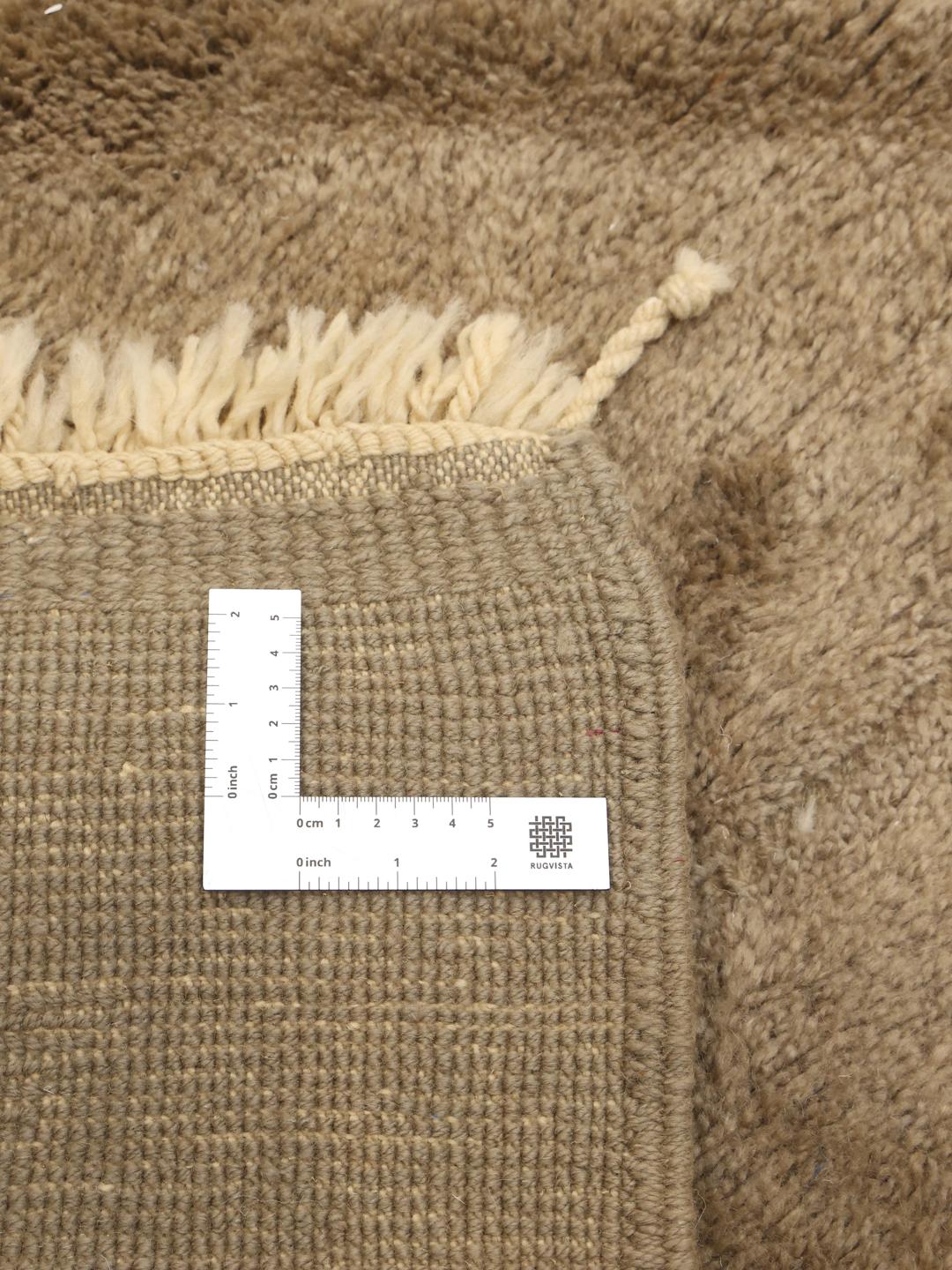 Håndknyttet marokkansk tæppe med en blød beige uldluve og geometriske linjer