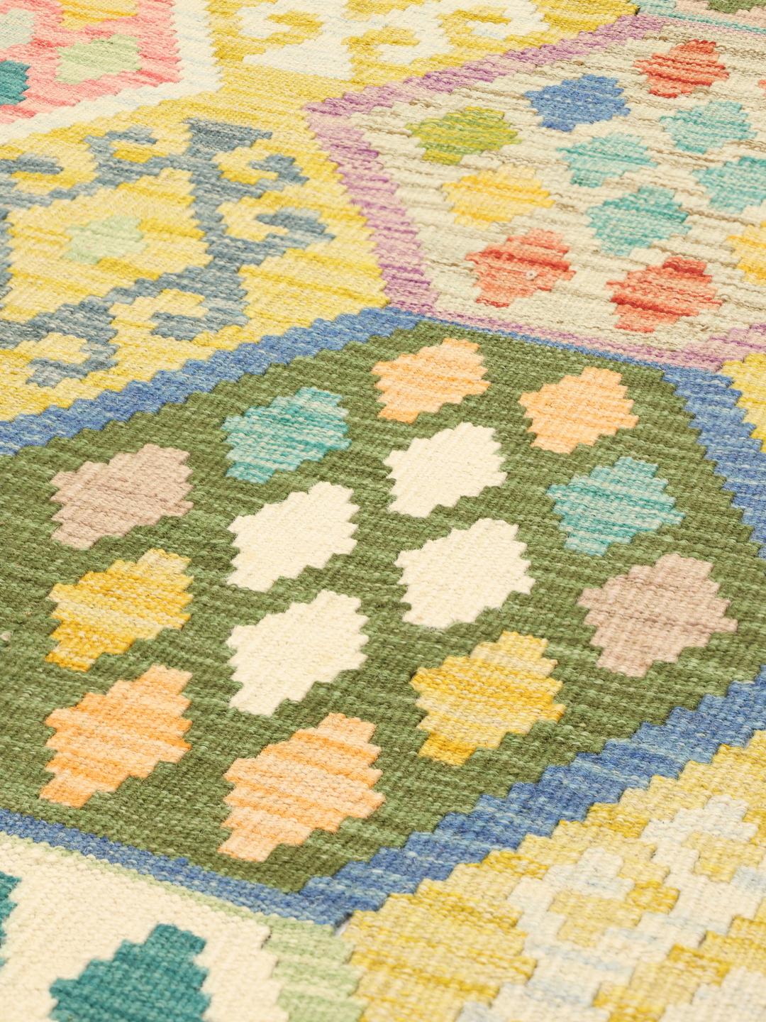 Hand-woven Afghan Kelim rug with geometric patterns in multicolor wool